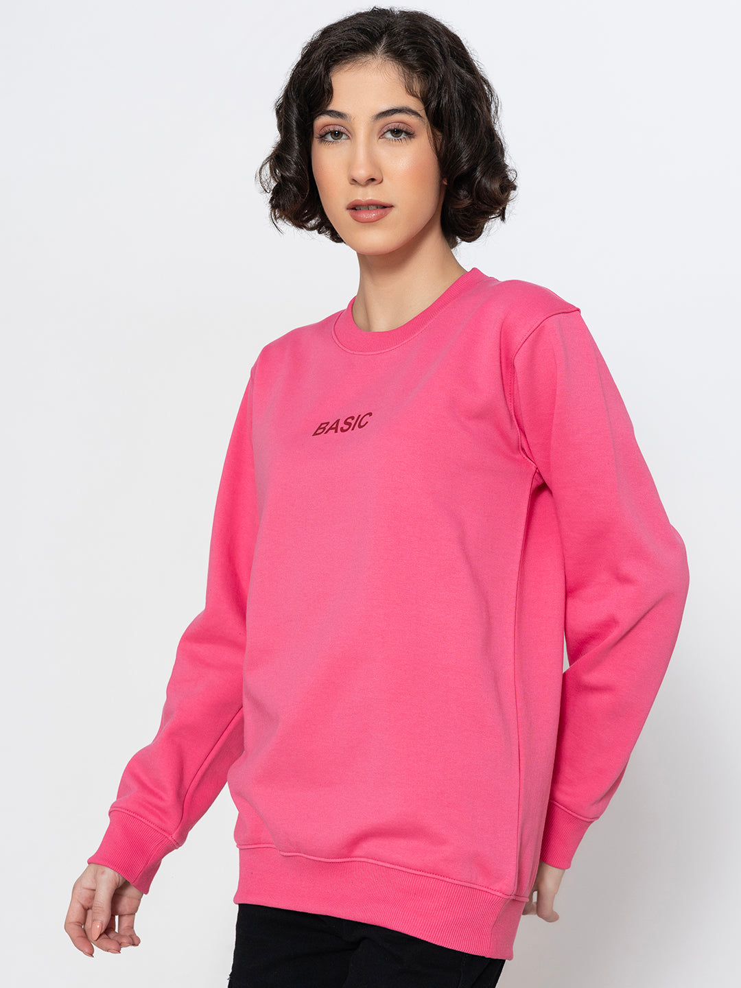 Close-up of ribbed cuff on pink sweatshirt