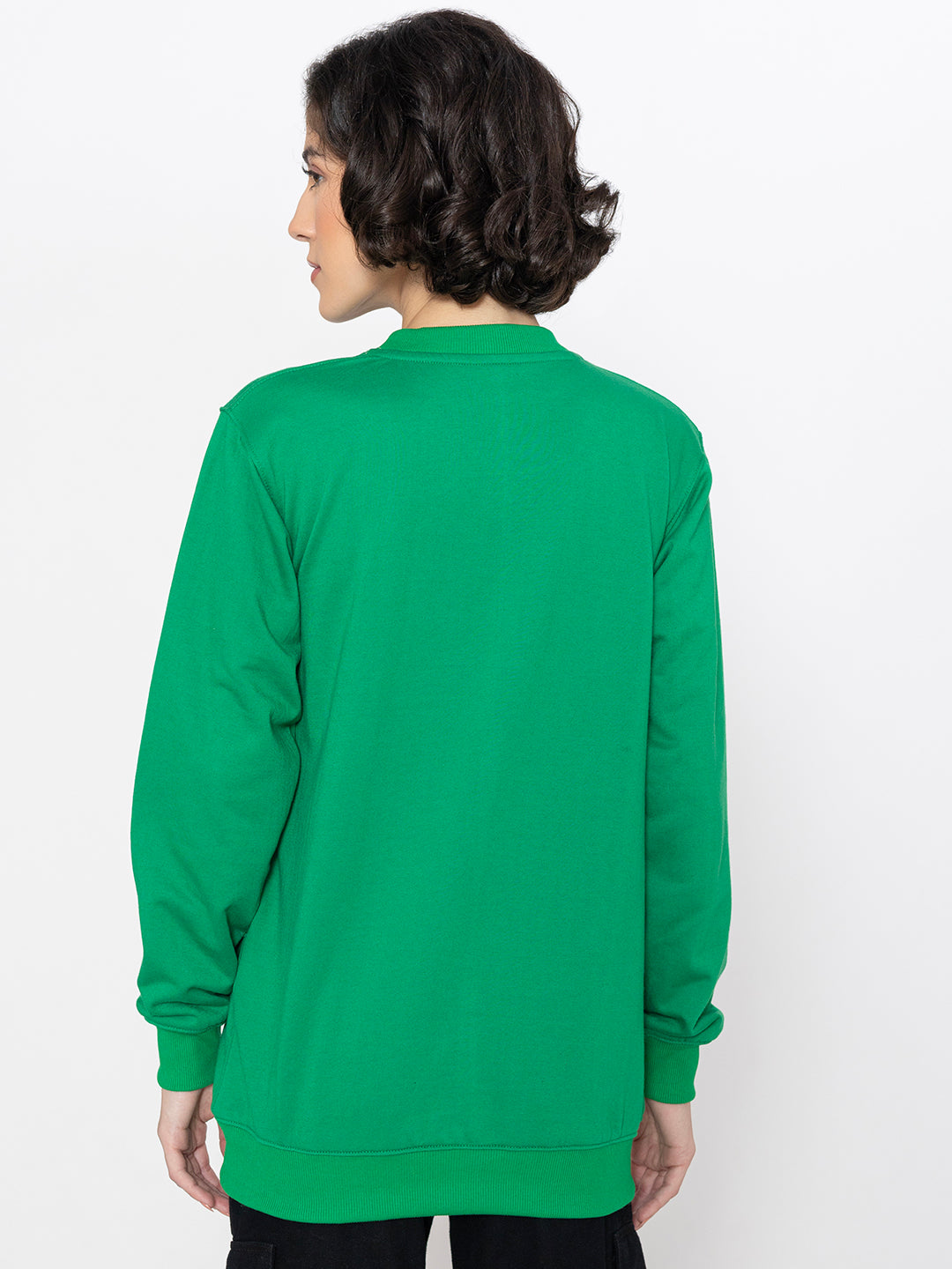 Green cotton sweatshirt shown in soft daylight