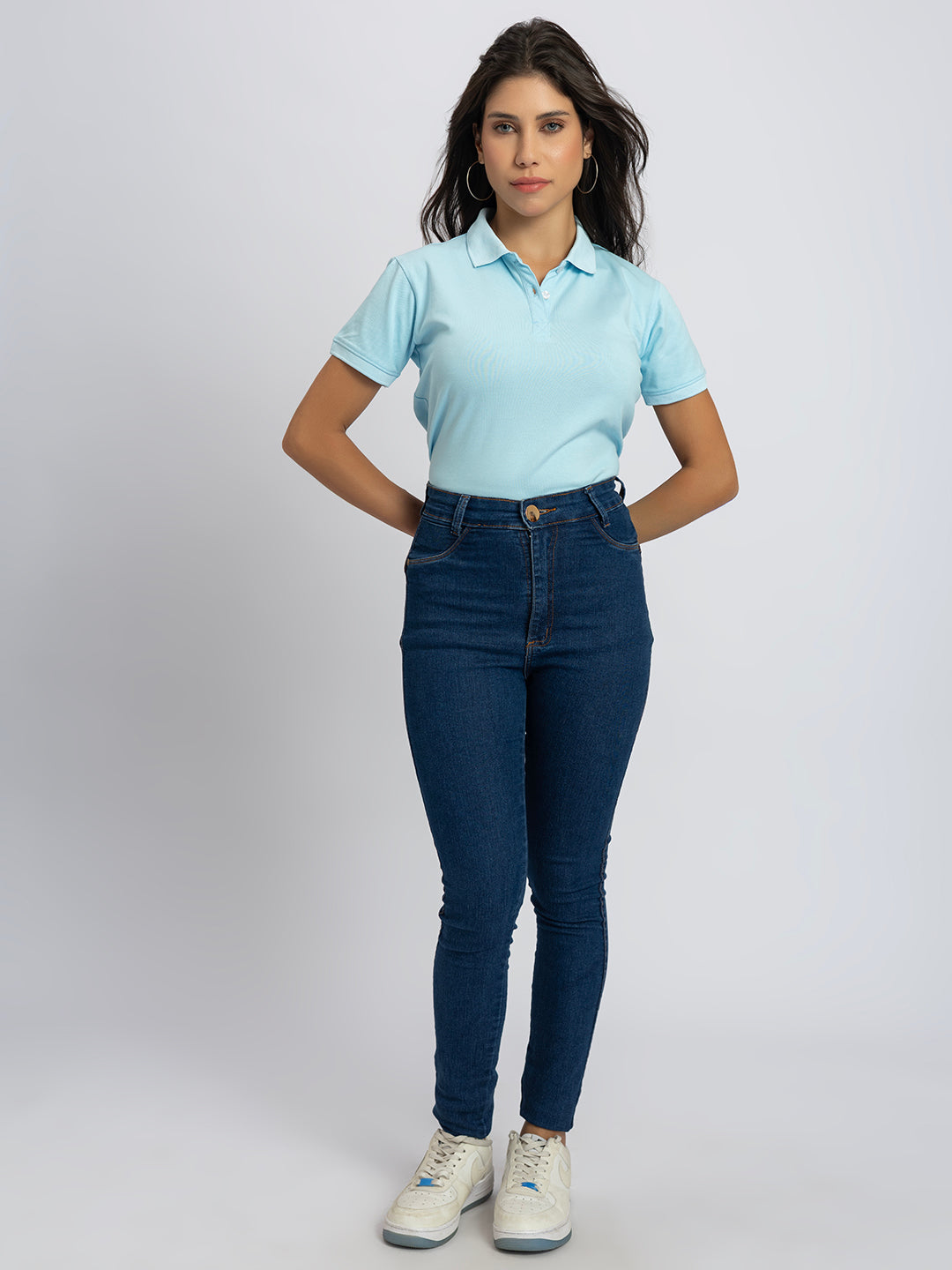 Close-up of polo collar on sky blue cotton T-shirt