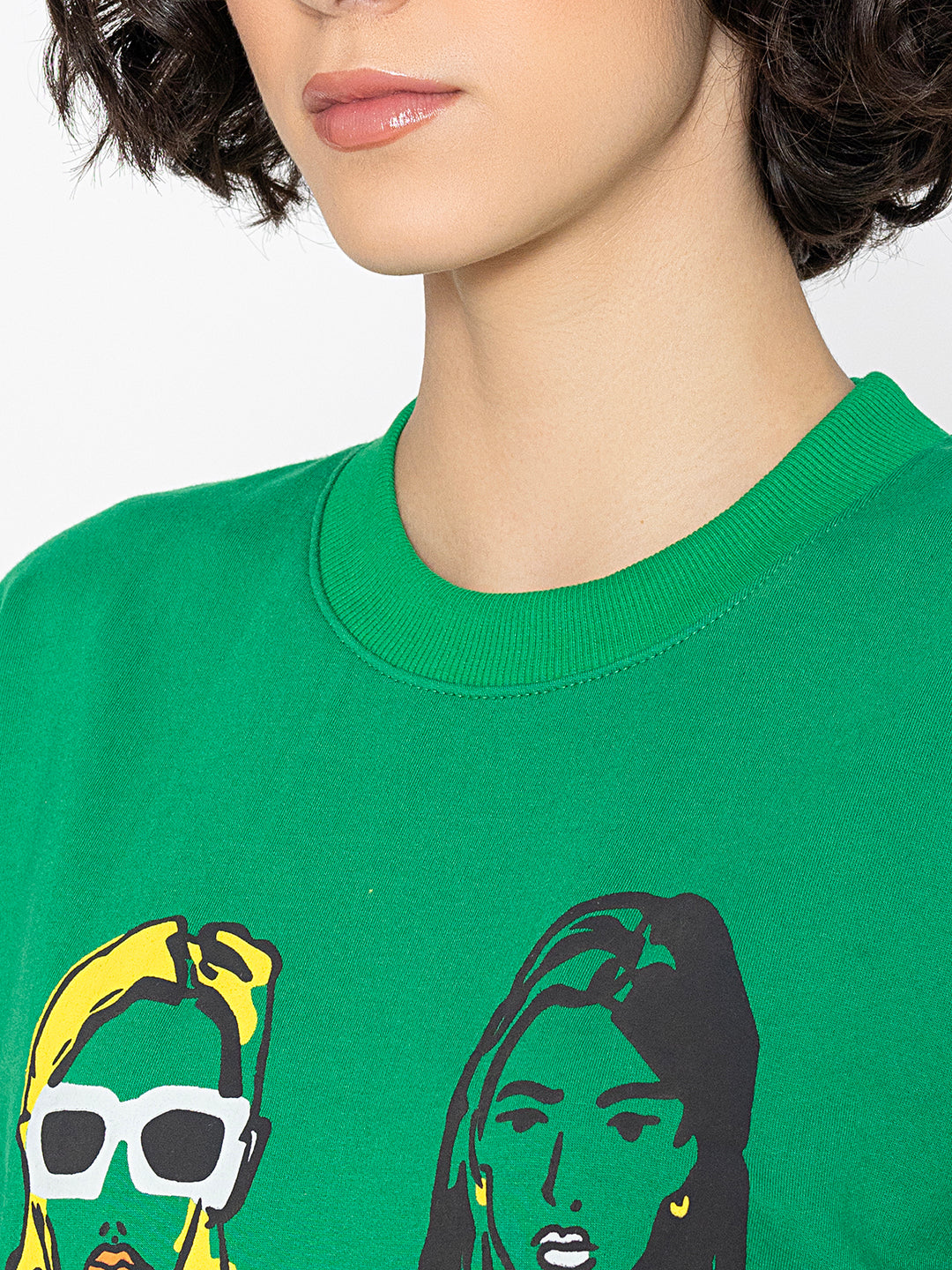 Full-length view of green relaxed sweatshirt