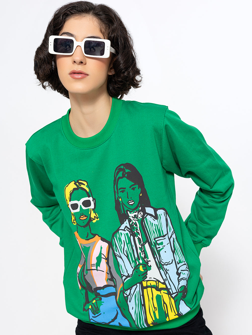 Side view of green sweatshirt with illustrated print