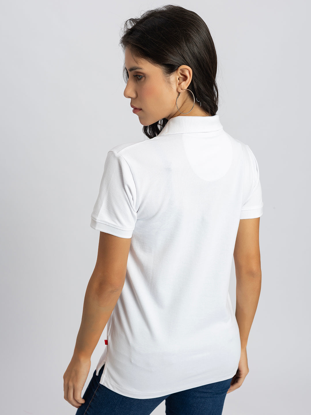 Close-up of polo collar on white cotton T-shirt