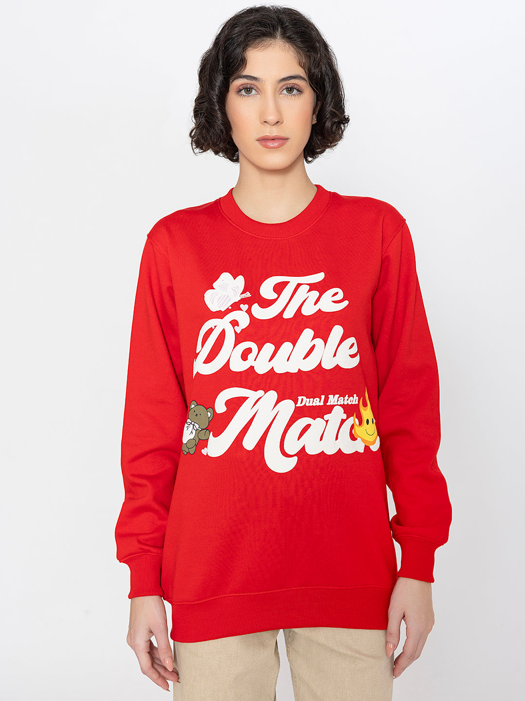 Close-up of graphic print on red sweatshirt