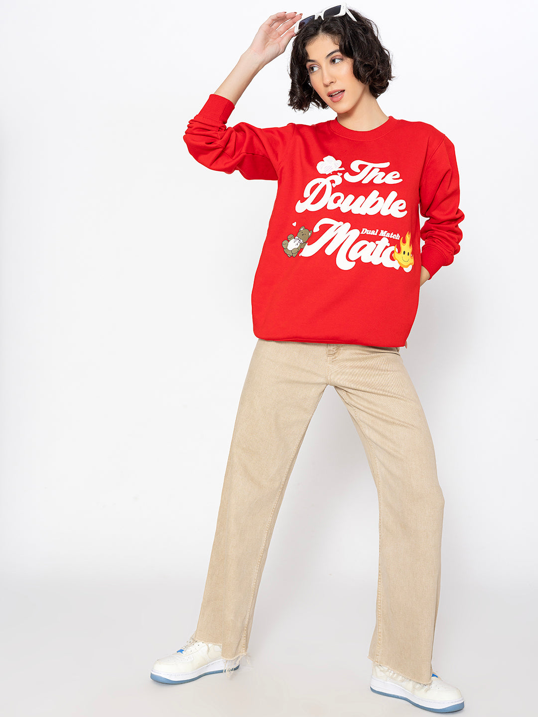 Detail of ribbed cuffs on red sweatshirt