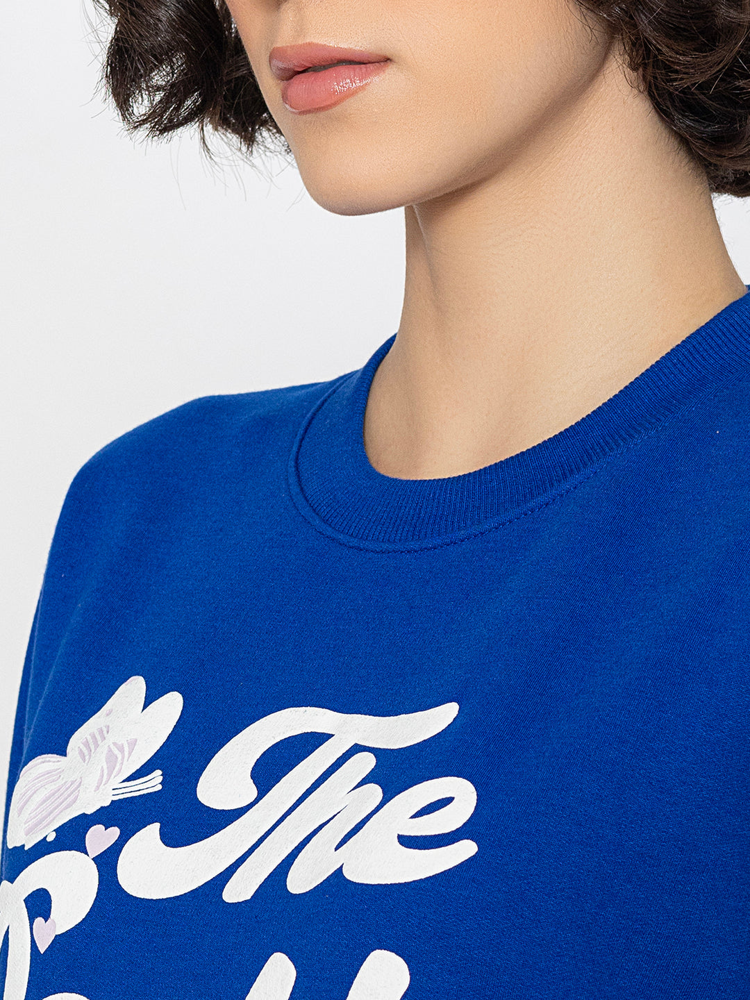 Full-length view of blue relaxed sweatshirt