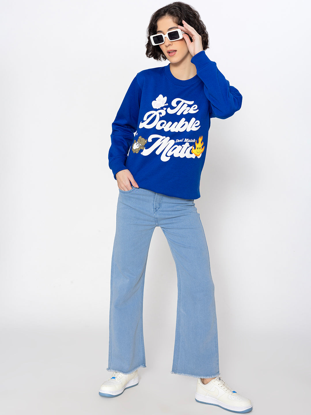 Detail of ribbed cuffs on blue sweatshirt
