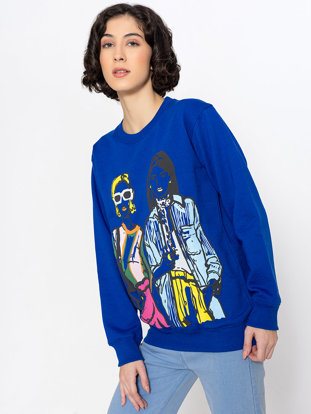 Close-up of illustrated graphic on blue sweatshirt