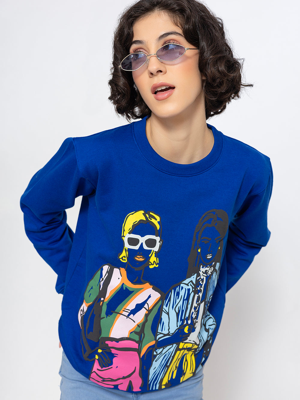 Side view of blue cotton sweatshirt showing relaxed fit