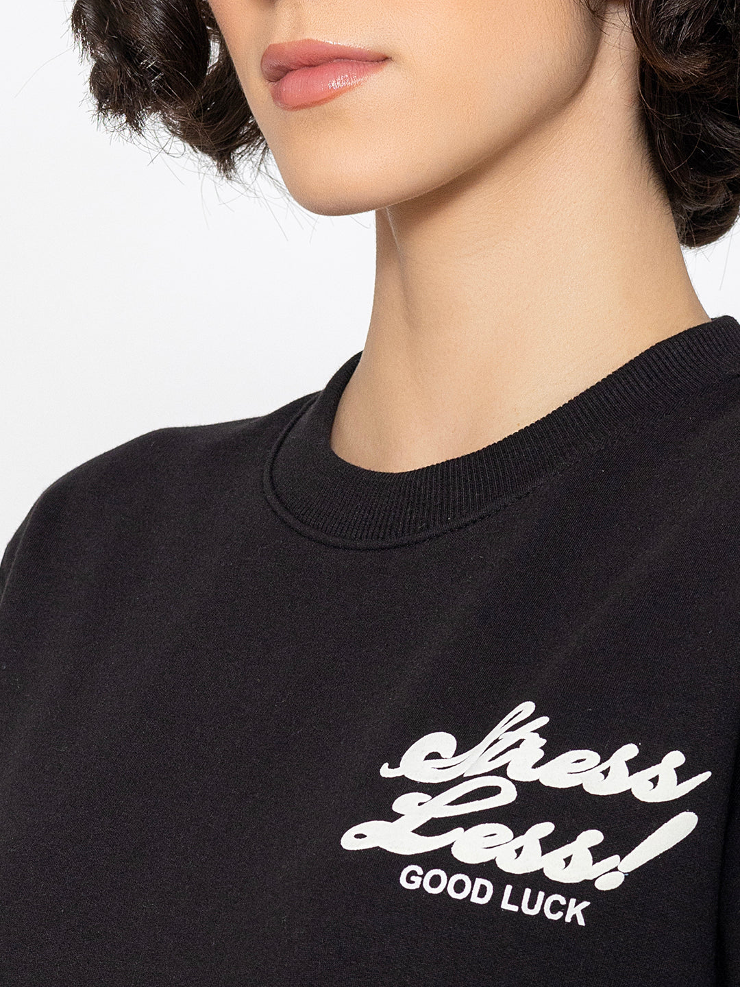 Full-length view of black relaxed sweatshirt
