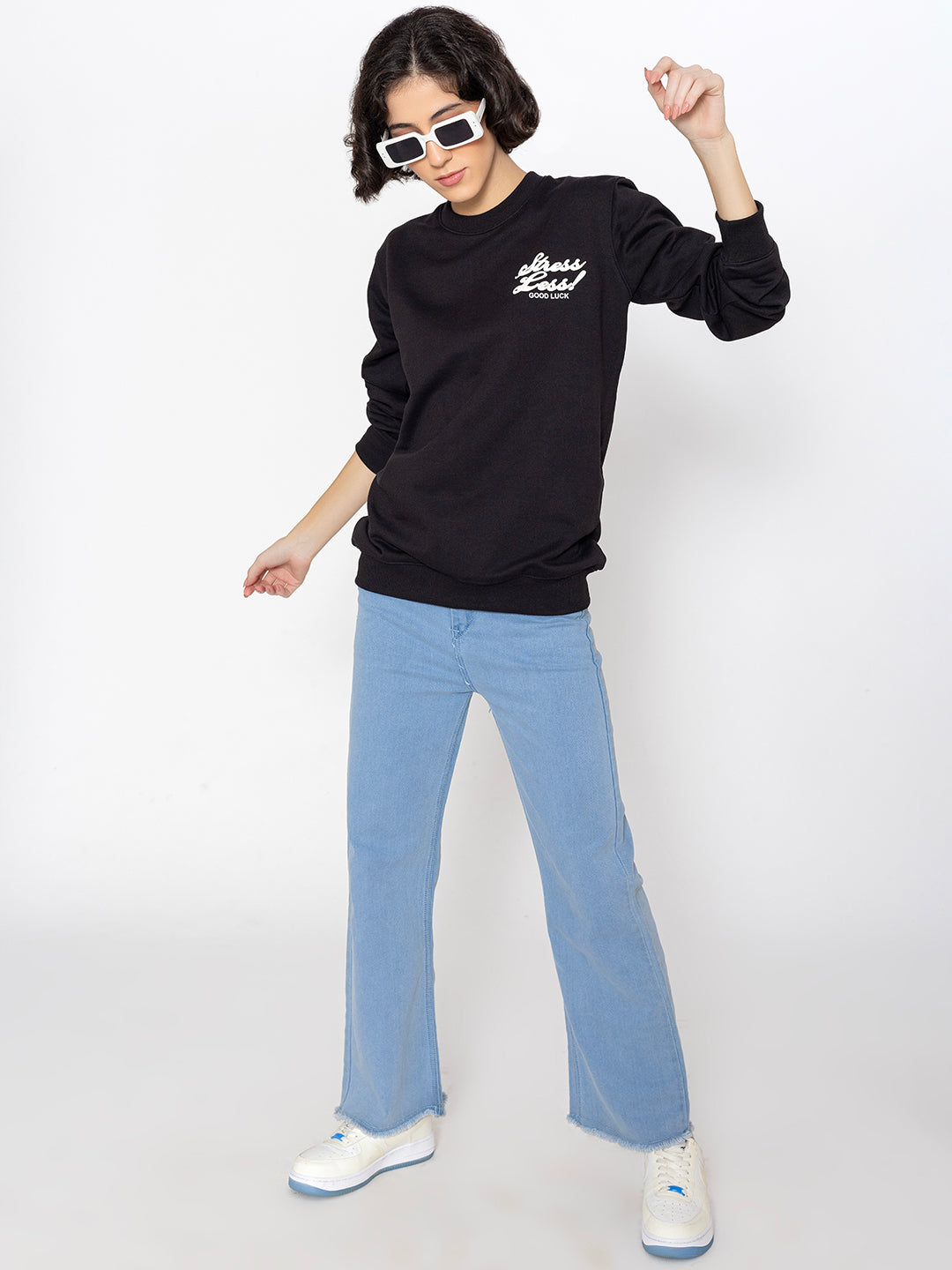 Detail of ribbed cuffs on black sweatshirt
