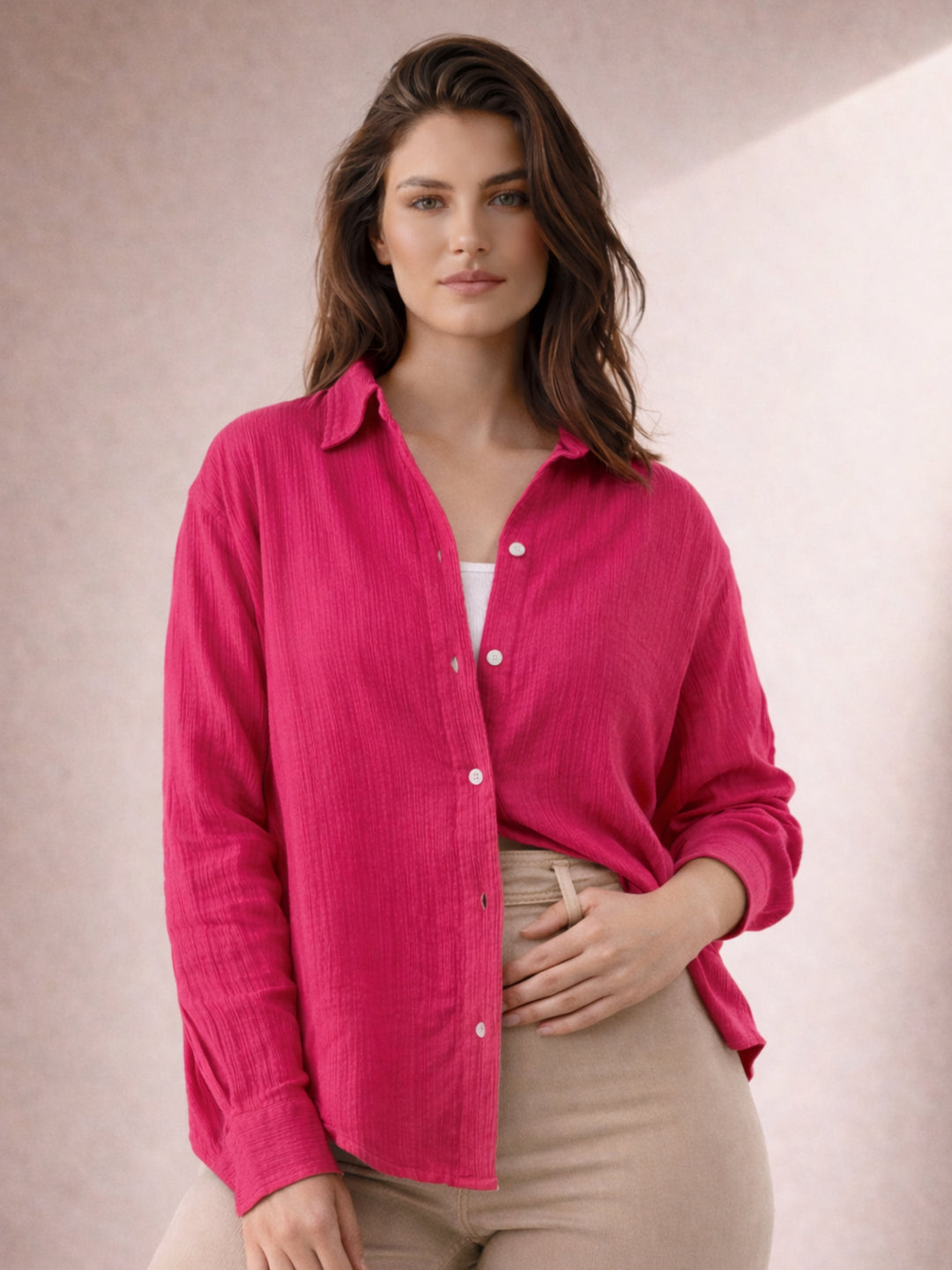 Front view of pink wrinkled cotton oversized shirt