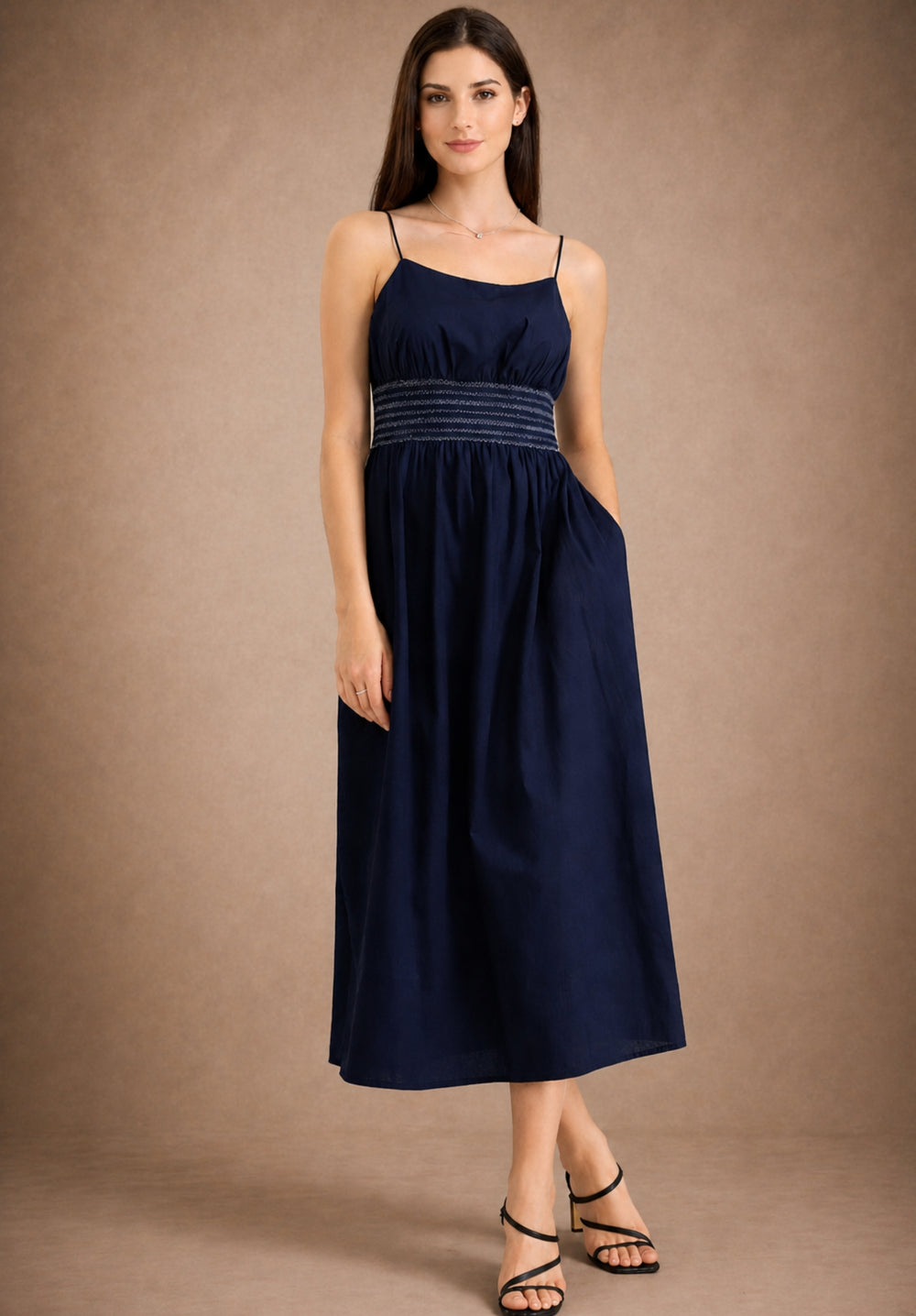 Side view of navy A-line embroidery dress in pure cotton