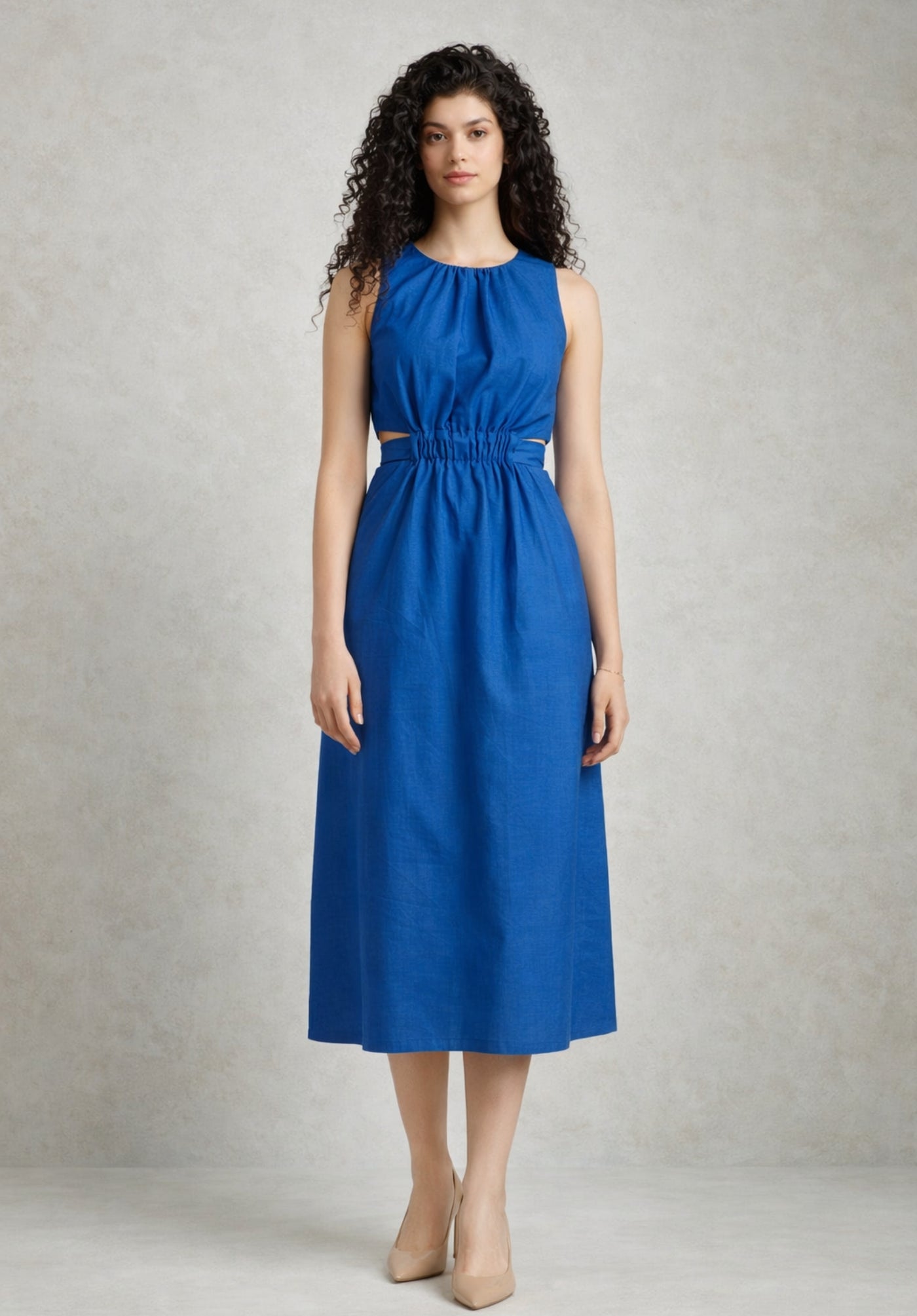 Close-up of tailored collar on blue cotton shirt dress