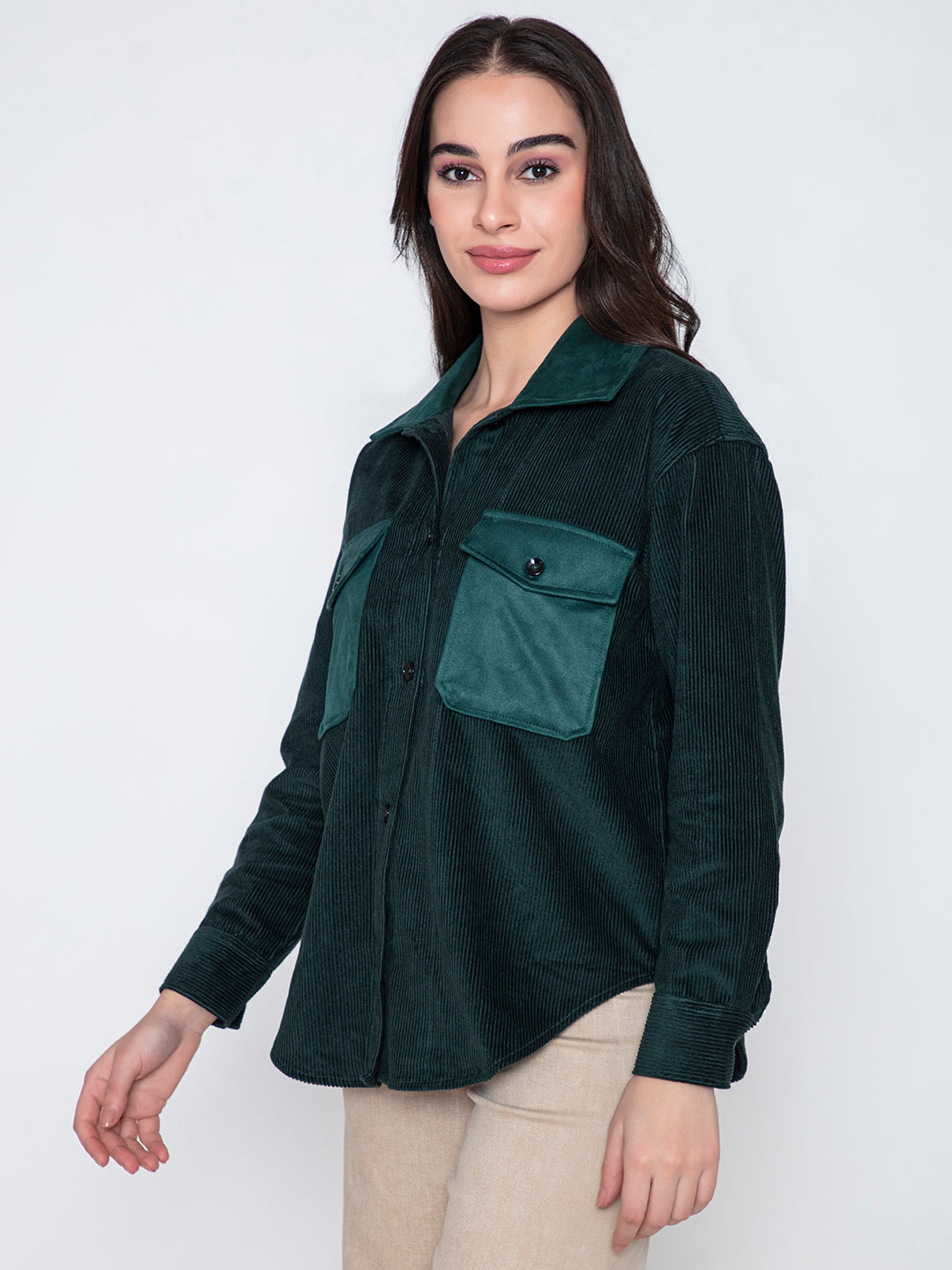 Lifestyle shot of model wearing green corduroy shacket