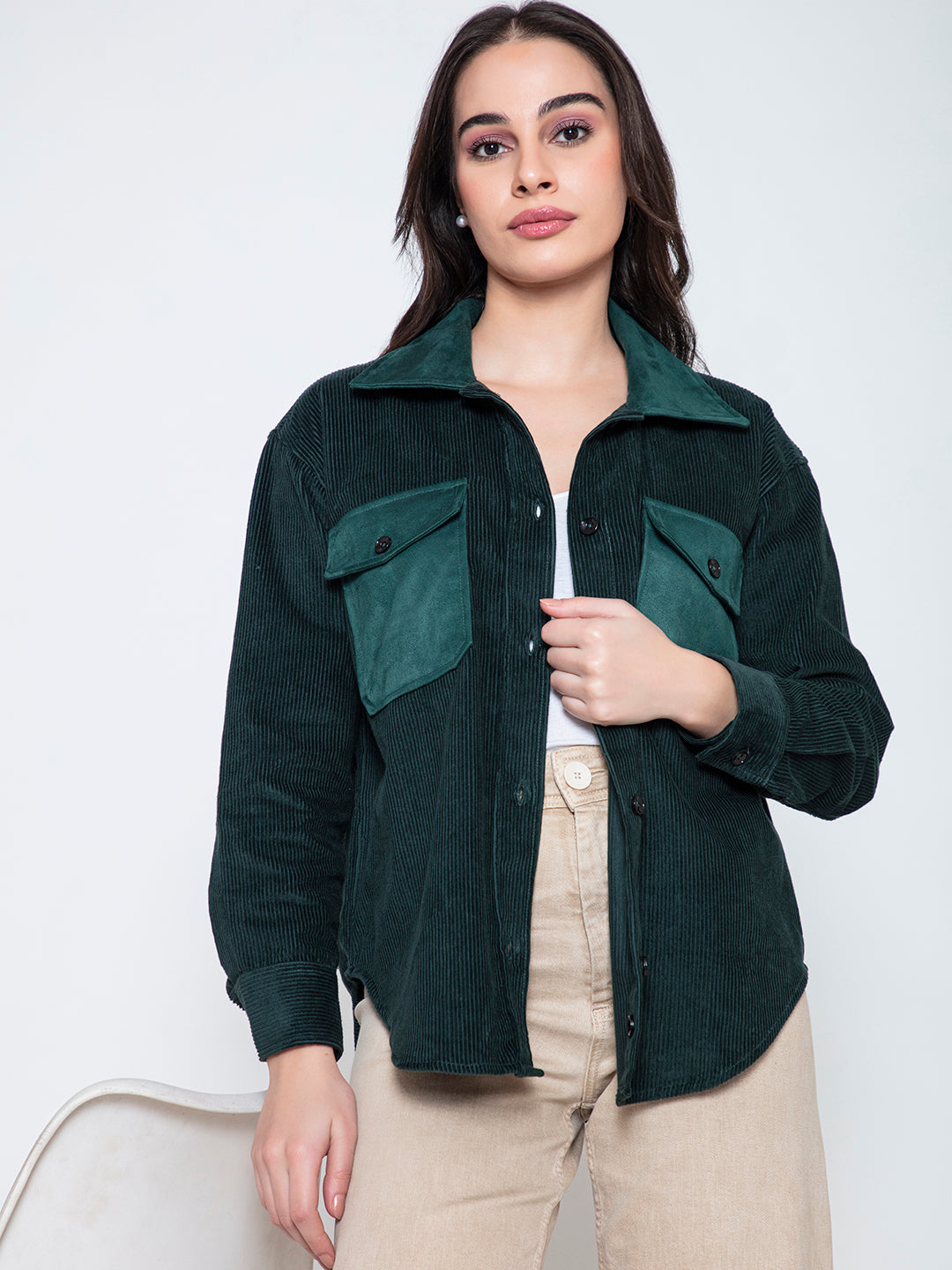 Close-up of plush corduroy texture in green shacket