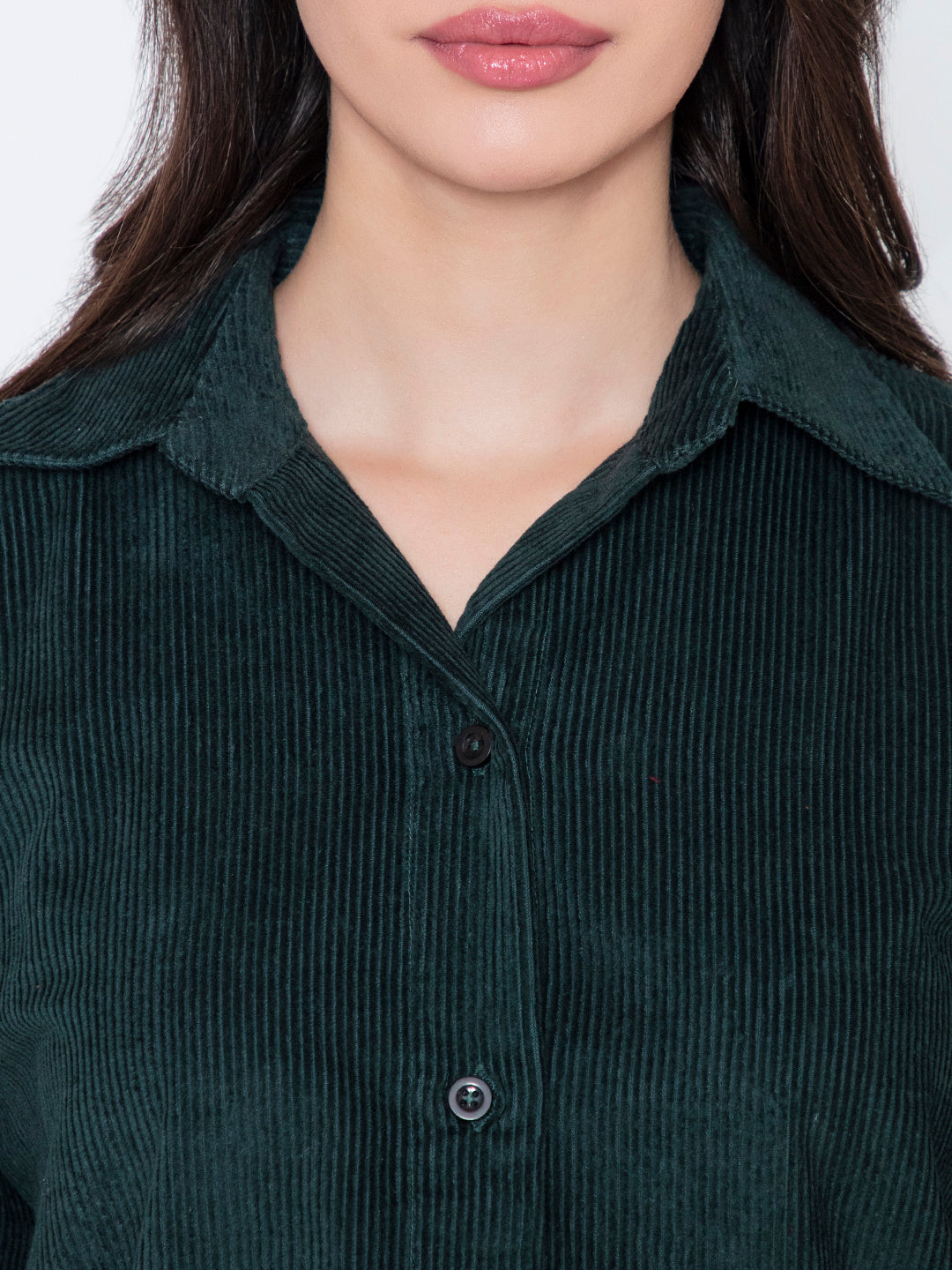 Side angle of green corduroy oversized shirt with spread collar
