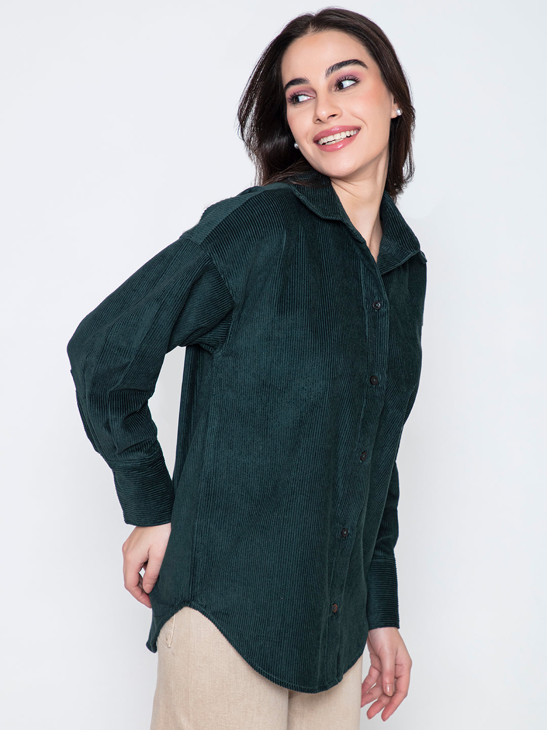 Close-up of plush corduroy texture in green