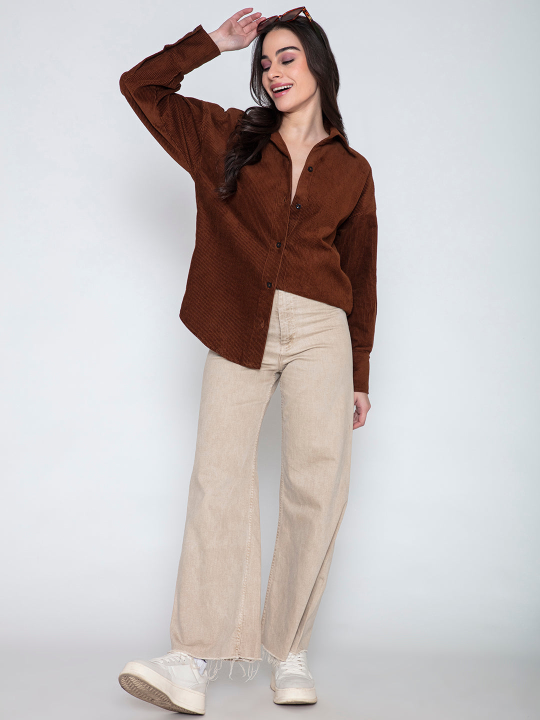 Close-up of plush corduroy texture in brown
