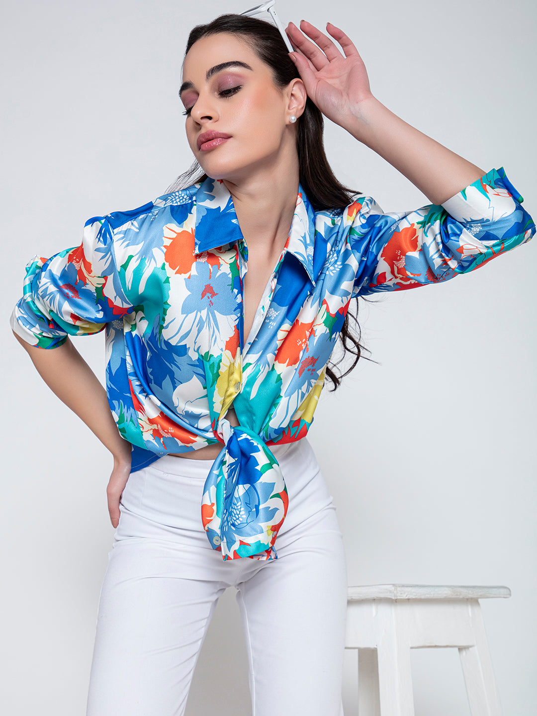 Side angle of blue floral print satin shirt