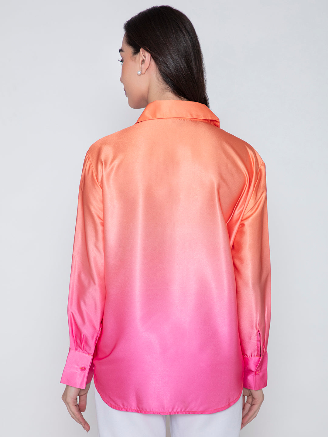 Lifestyle shot of model wearing pink ombre satin shirt