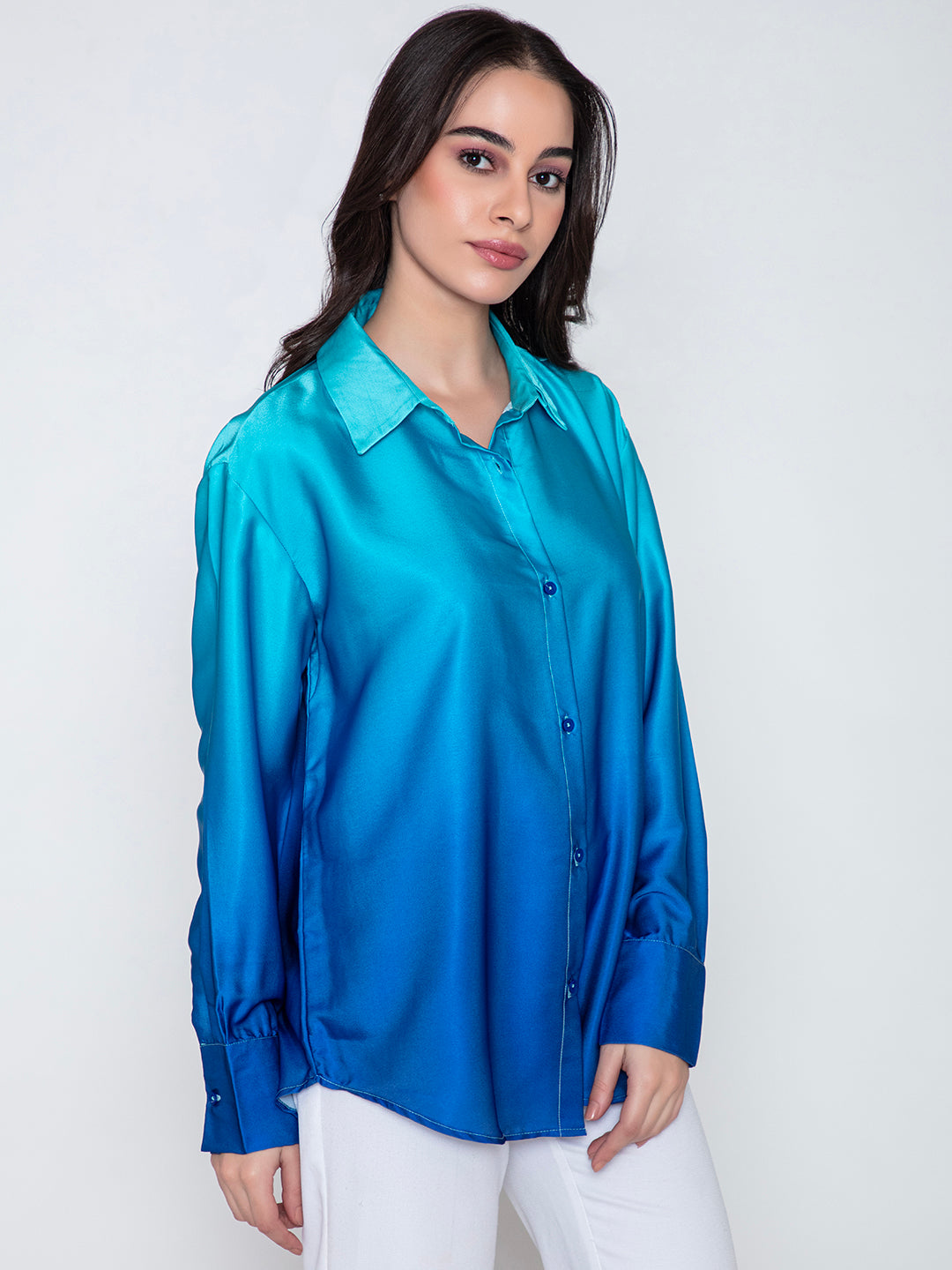 Detail of spread collar on blue ombre satin shirt