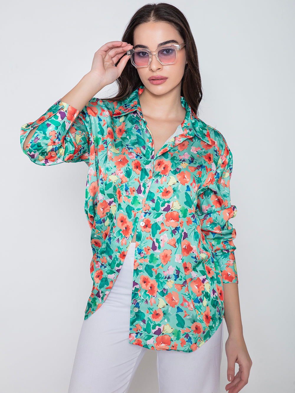 Green floral print satin shirt close-up of fabric