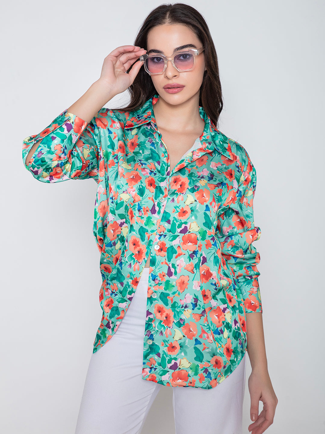 Green floral print satin shirt close-up of fabric