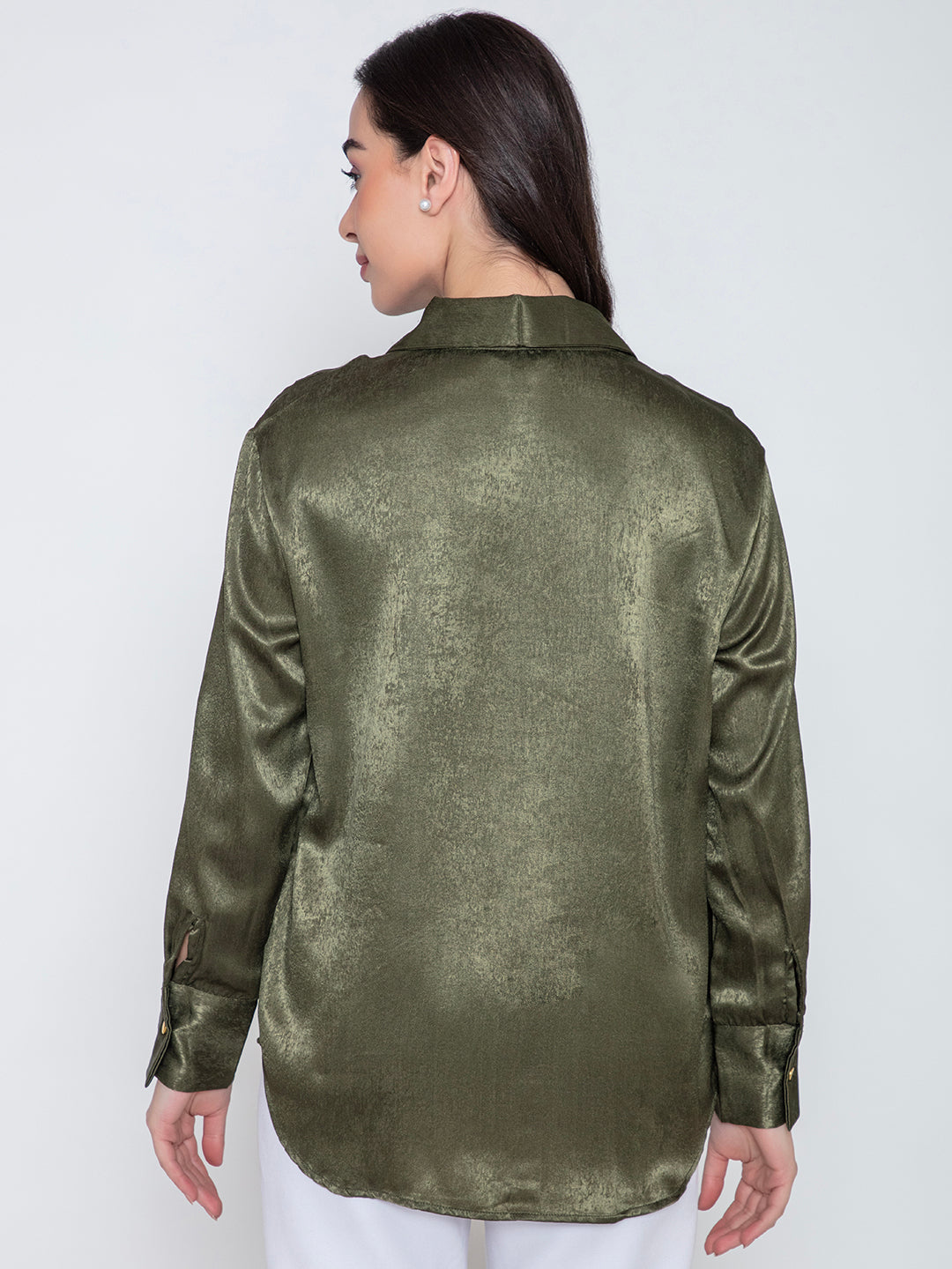 Detail of spread collar on green satin shirt