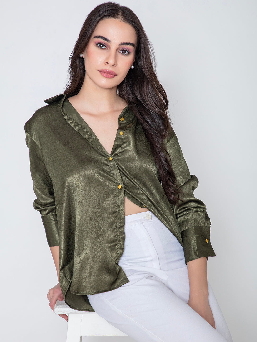 Front view of green satin relaxed shirt for women