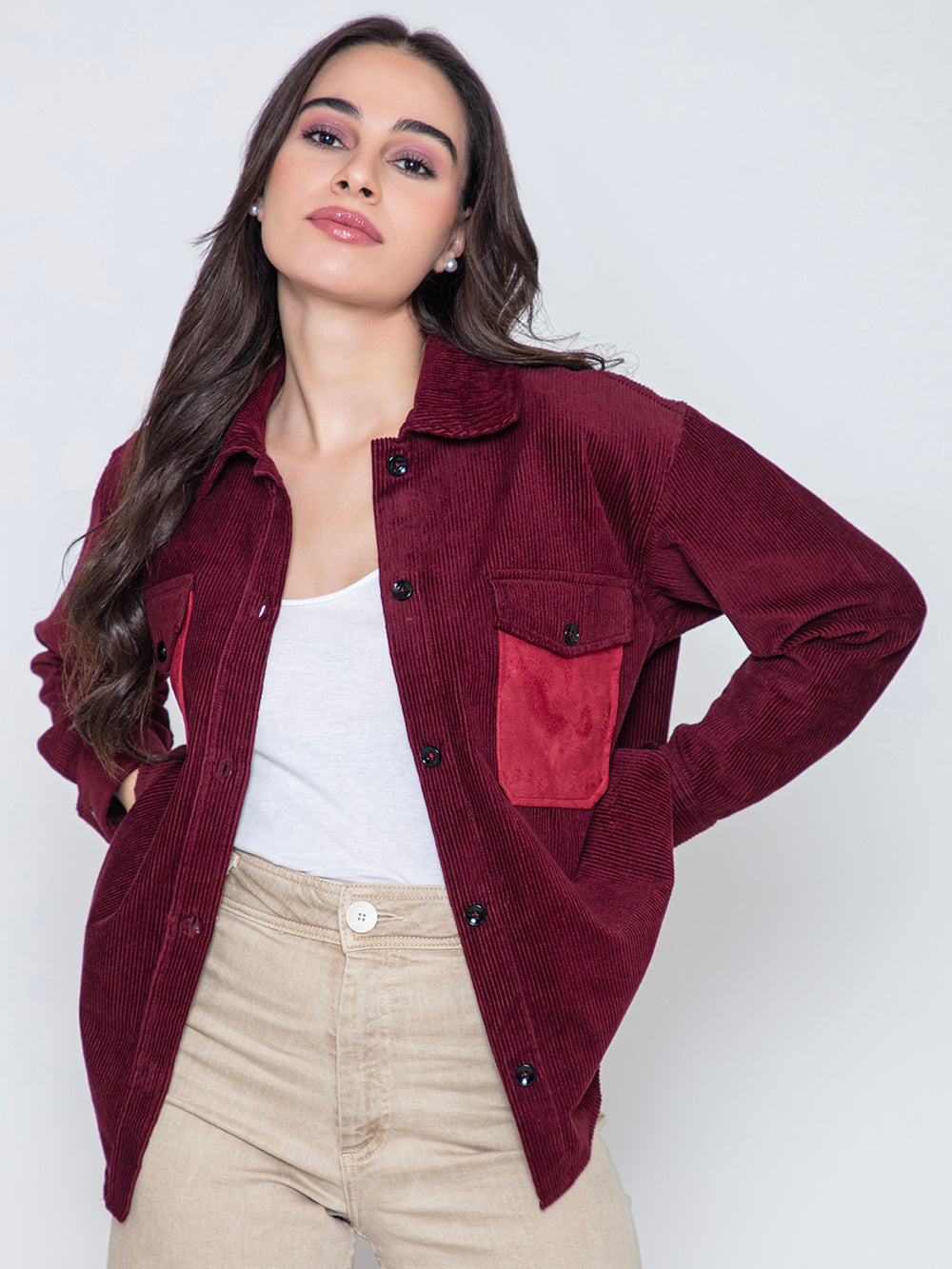 Side angle of maroon corduroy shacket layered open