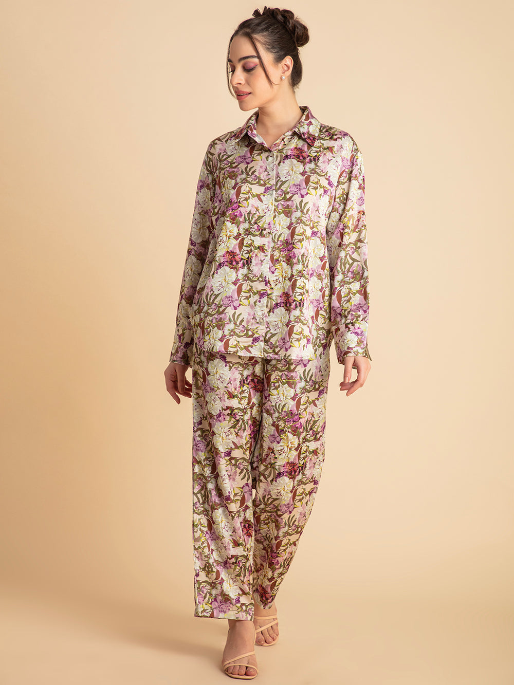 Side view of purple floral satin shirt and pant set