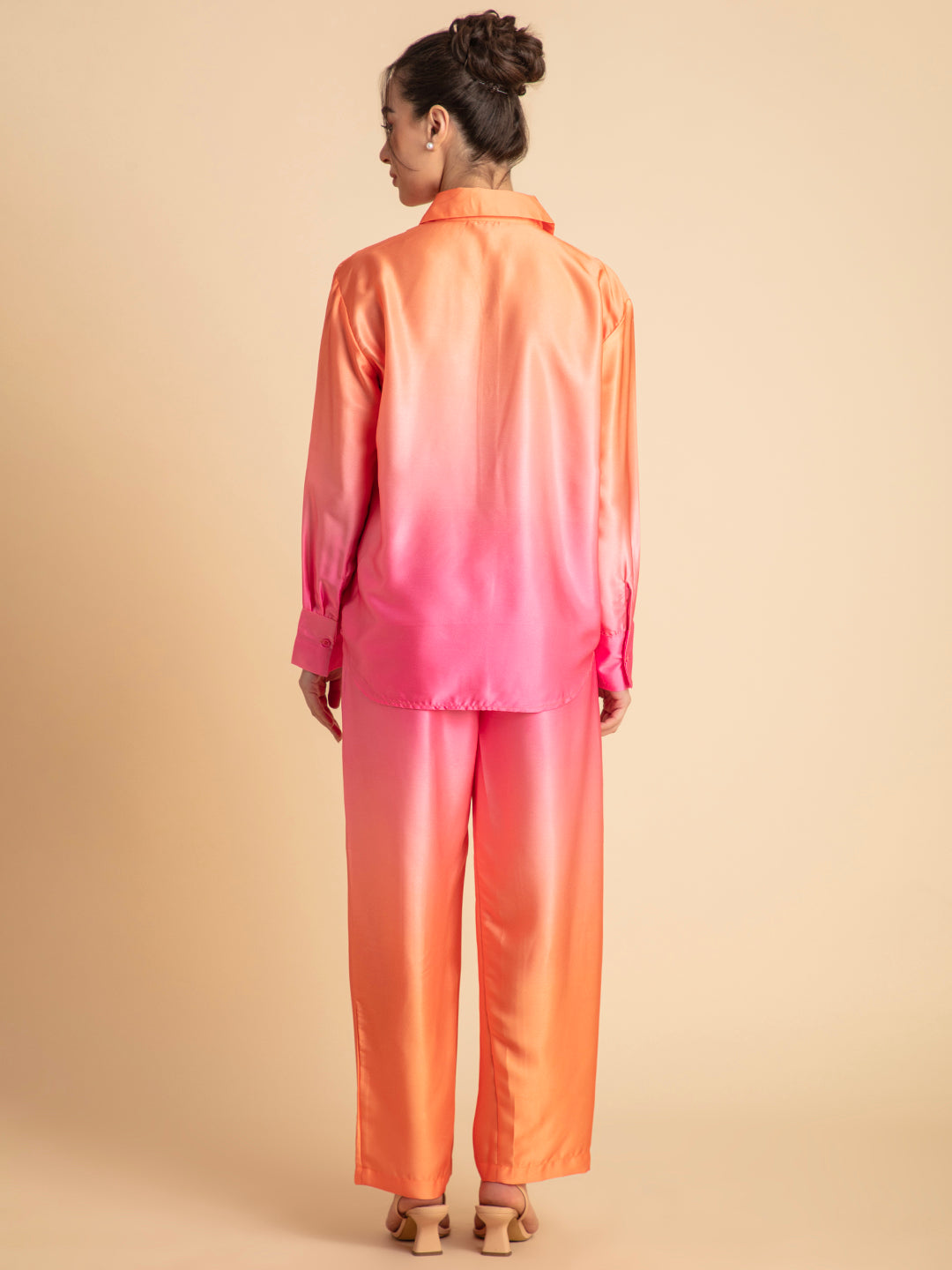 Detail of shirt collar on pink ombre satin