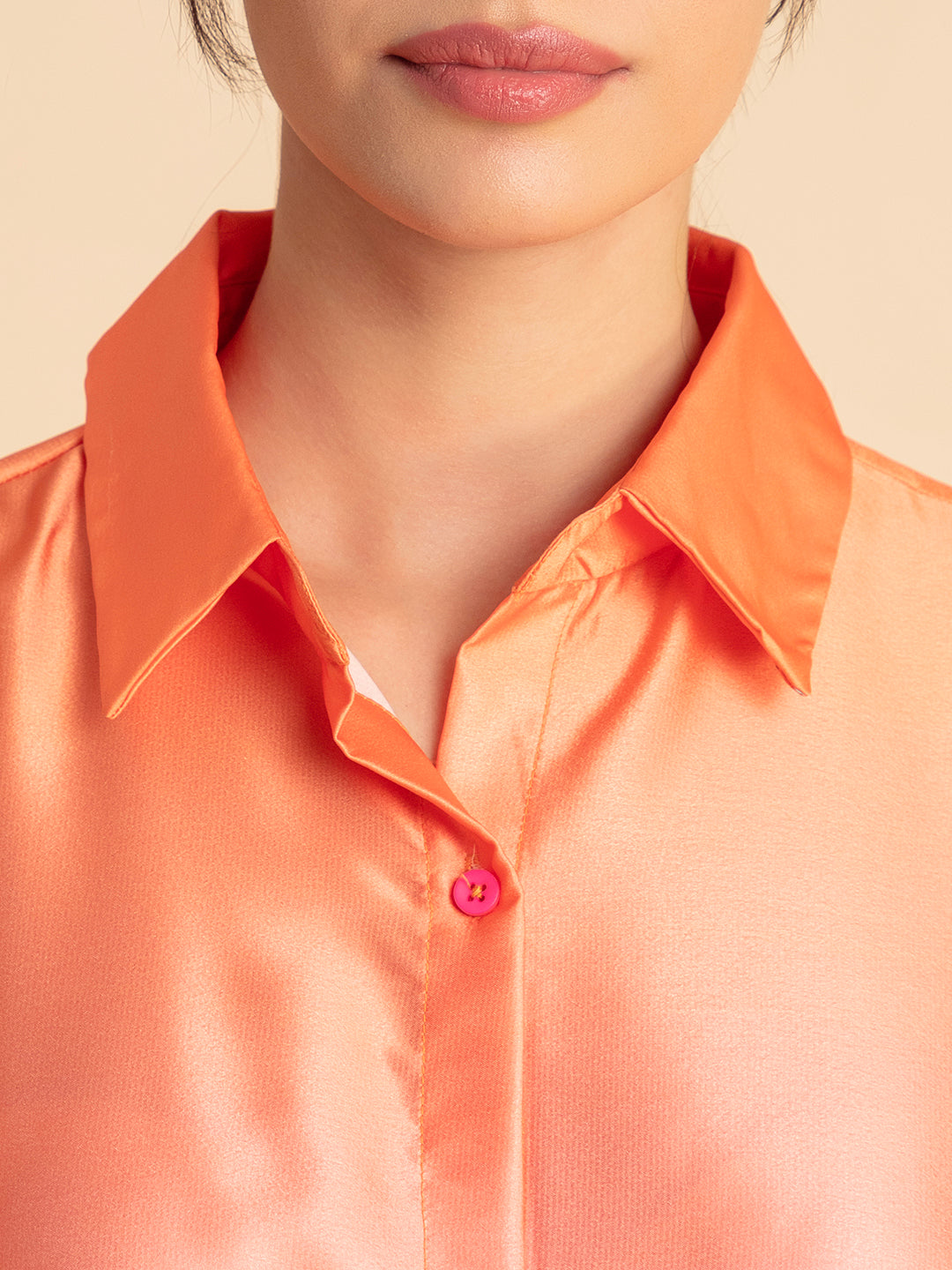 Detail of trouser elastic waist in pink ombre satin