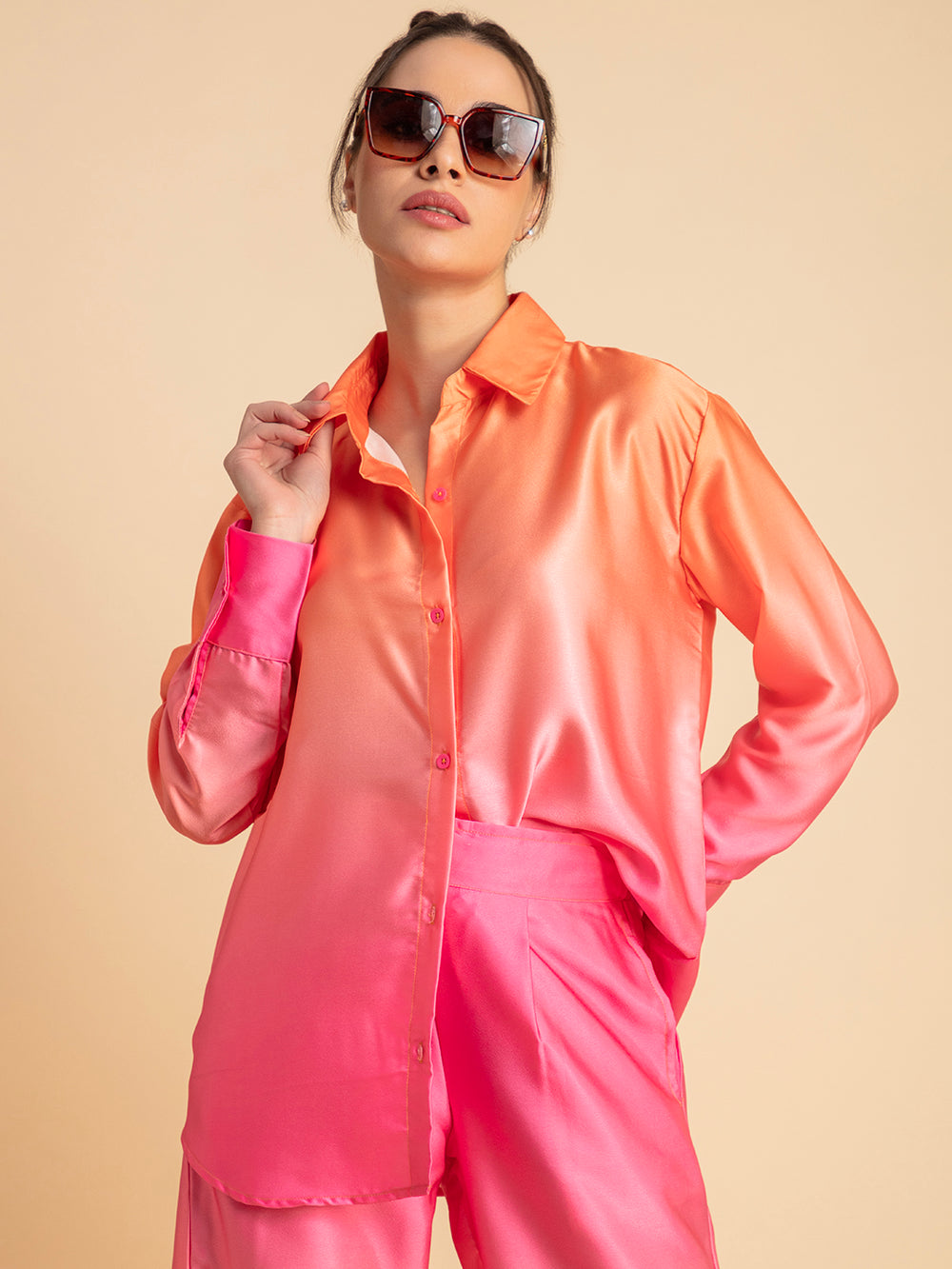 Side angle of pink ombre satin shirt and trouser set