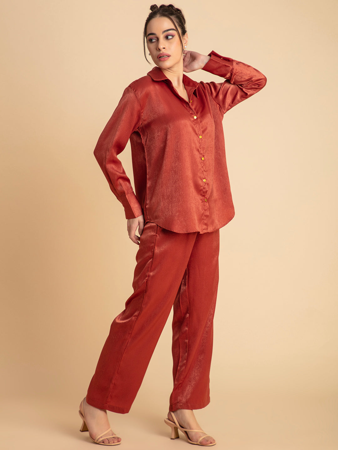 Close-up of lustrous maroon satin fabric