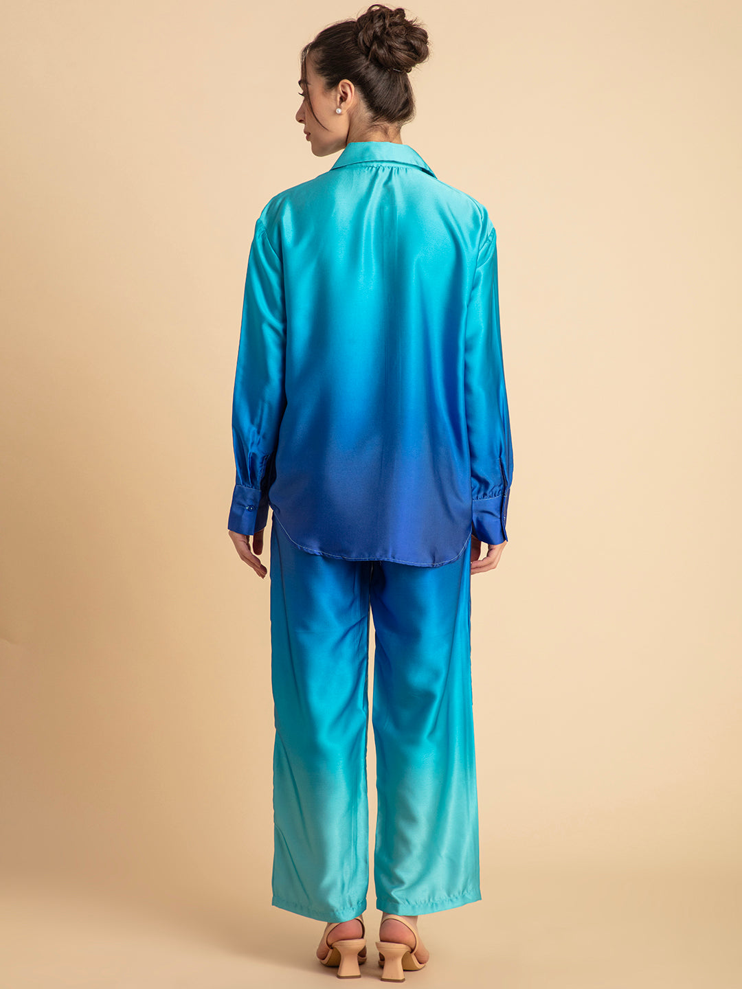 Detail of trouser elastic waist in blue ombre satin