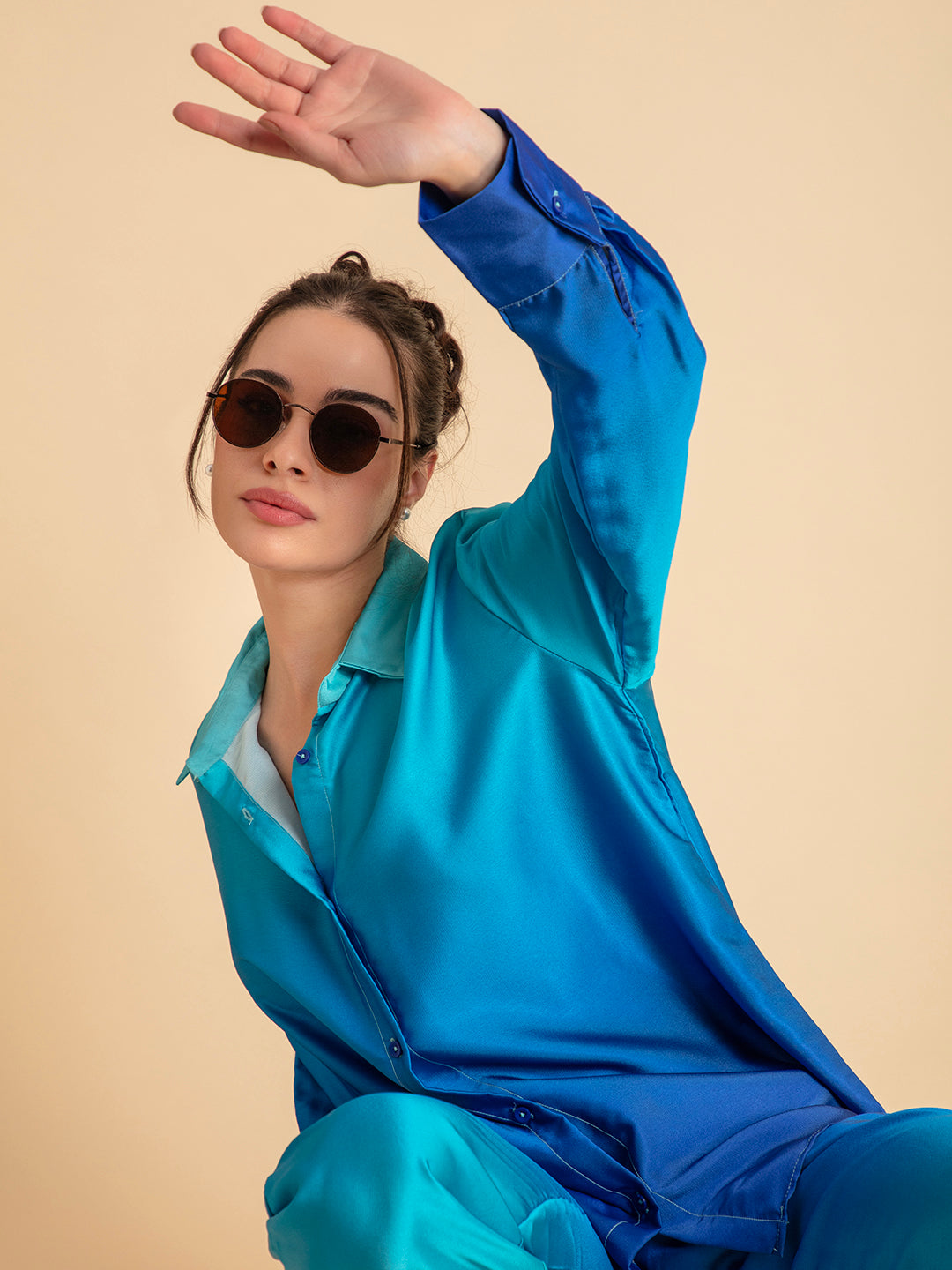 Side angle of blue ombre satin shirt and trouser