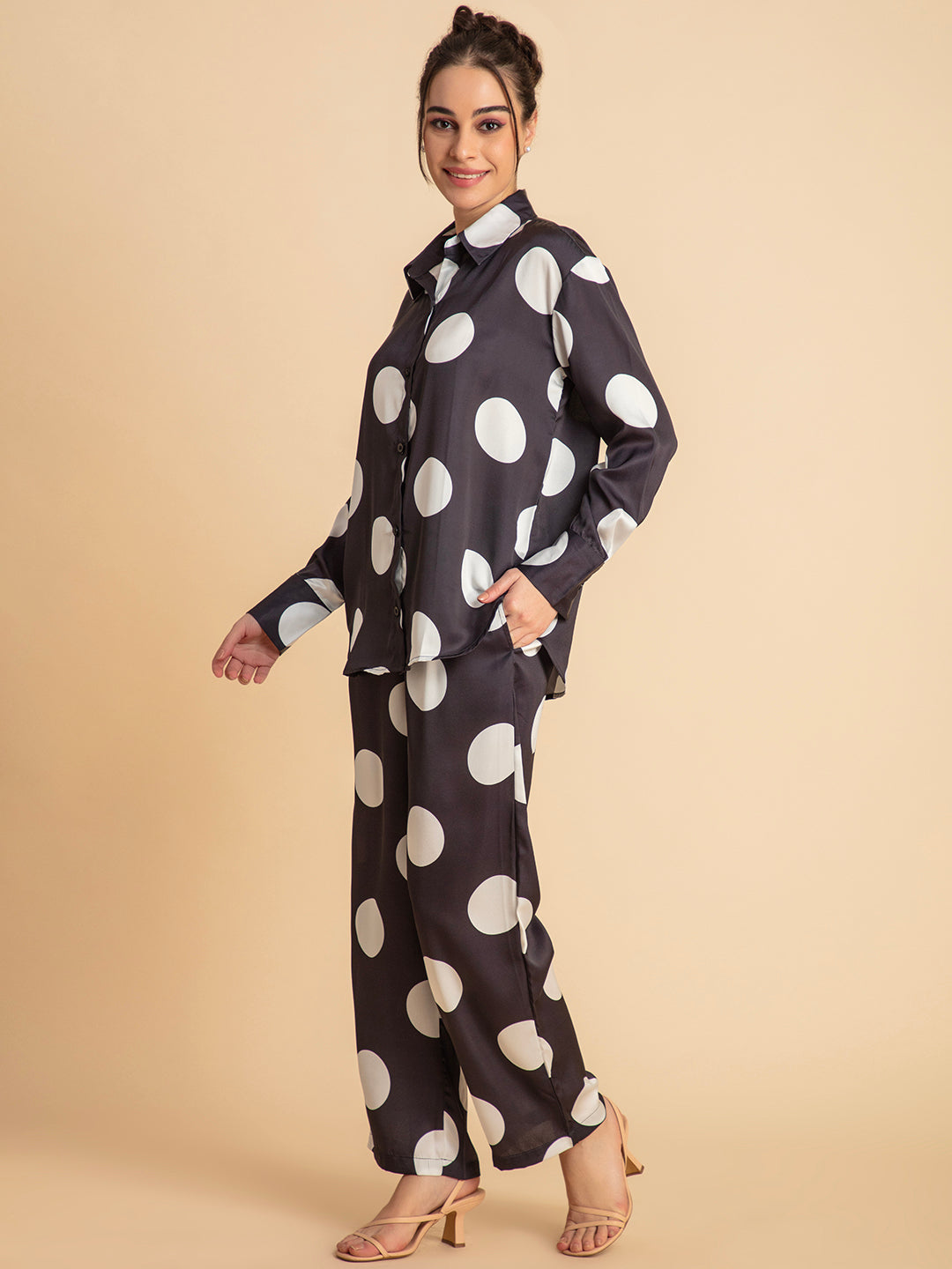Buttoned cuff detail on satin shirt