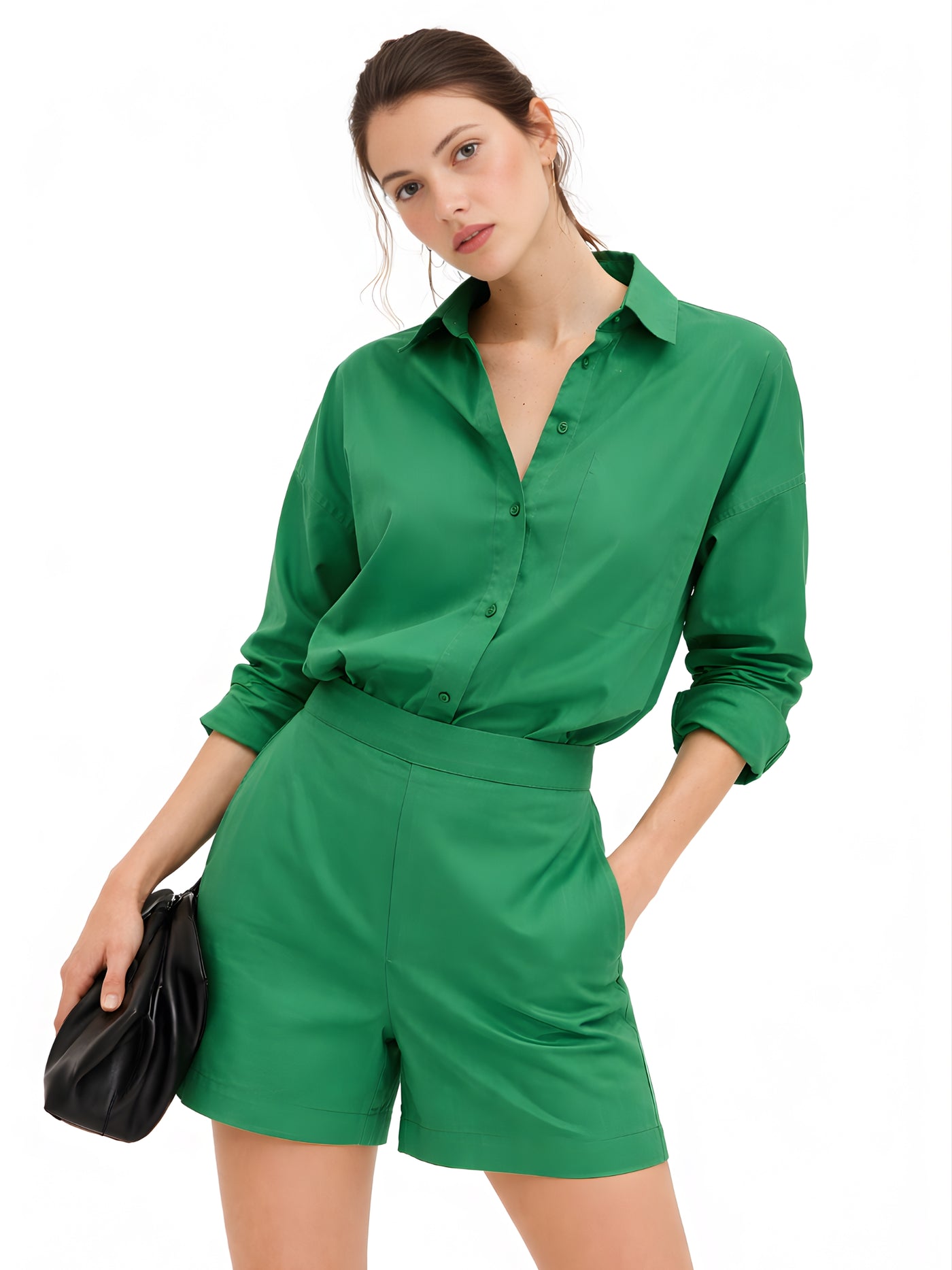 Front view of woman in green poplin cotton shorts co-ord set