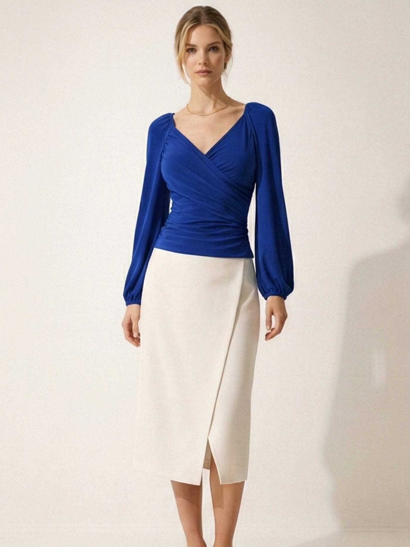 Side view of royal blue wrap top