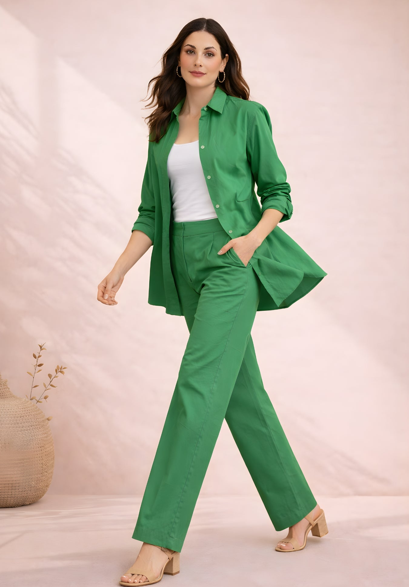Model wearing green poplin cotton co-ord set with relaxed fit shirt and trousers