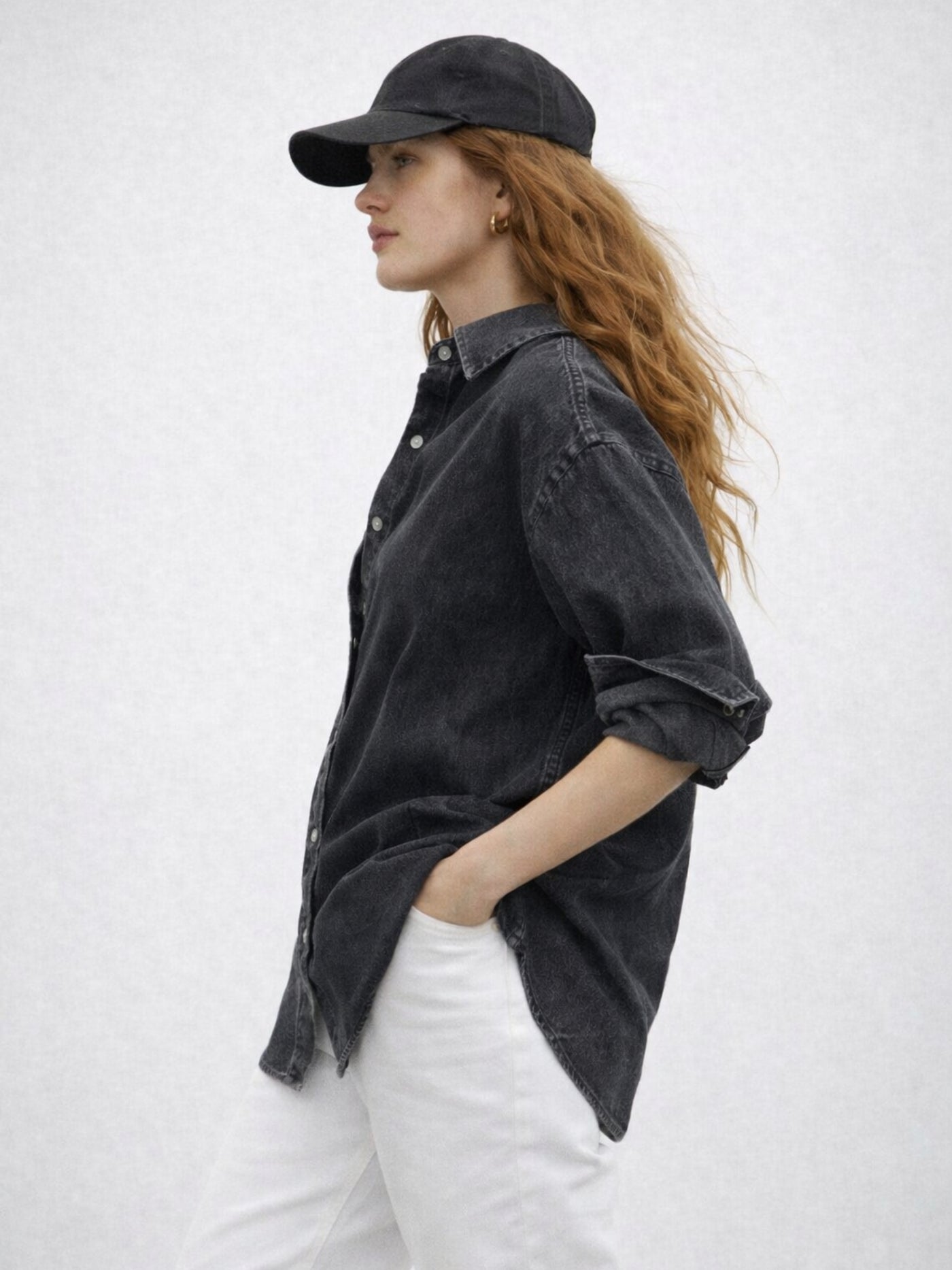 Close-up of cotton fabric on black oversized denim shirt