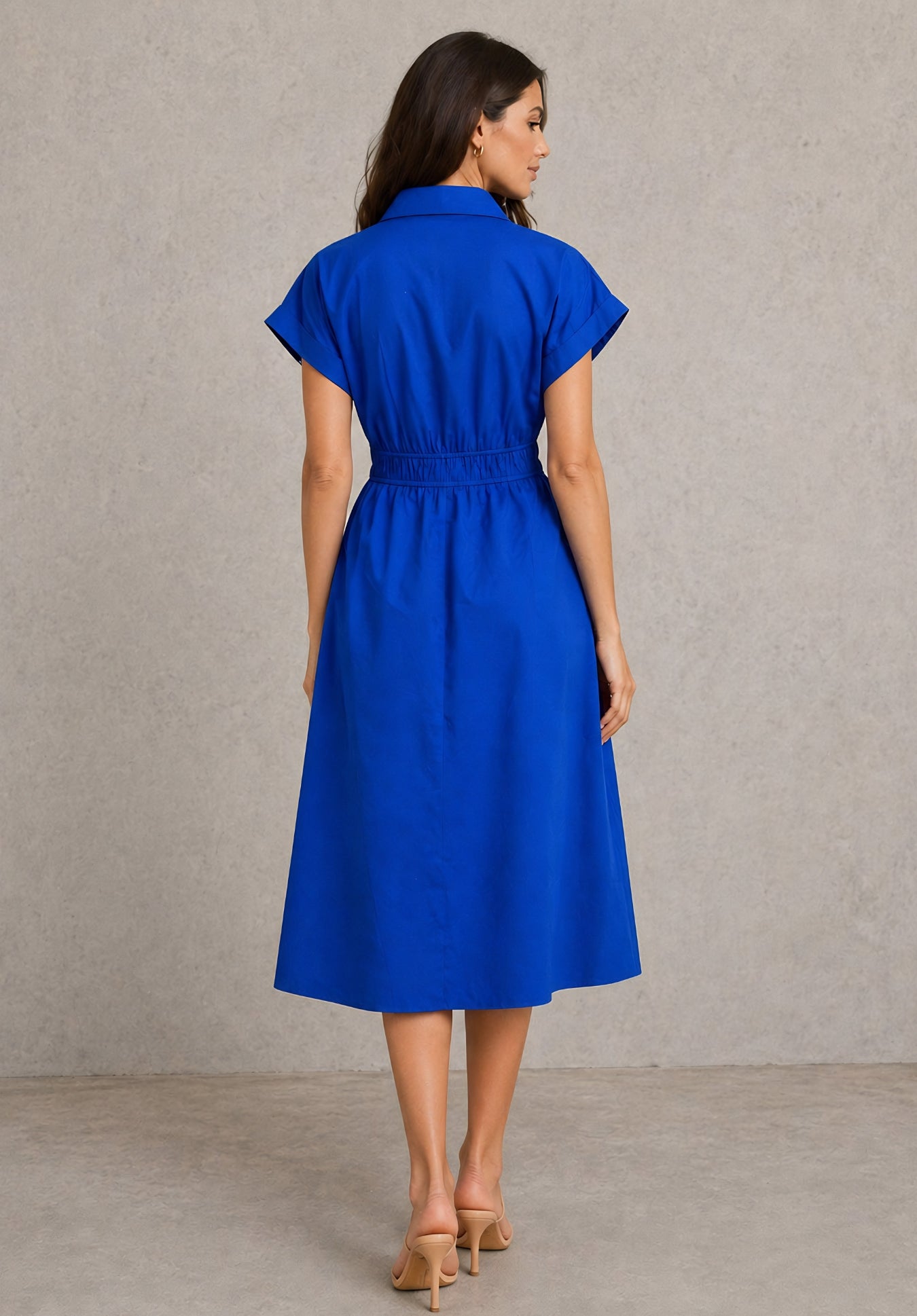 Back view of the Blue cotton dress showing the fitted bodice