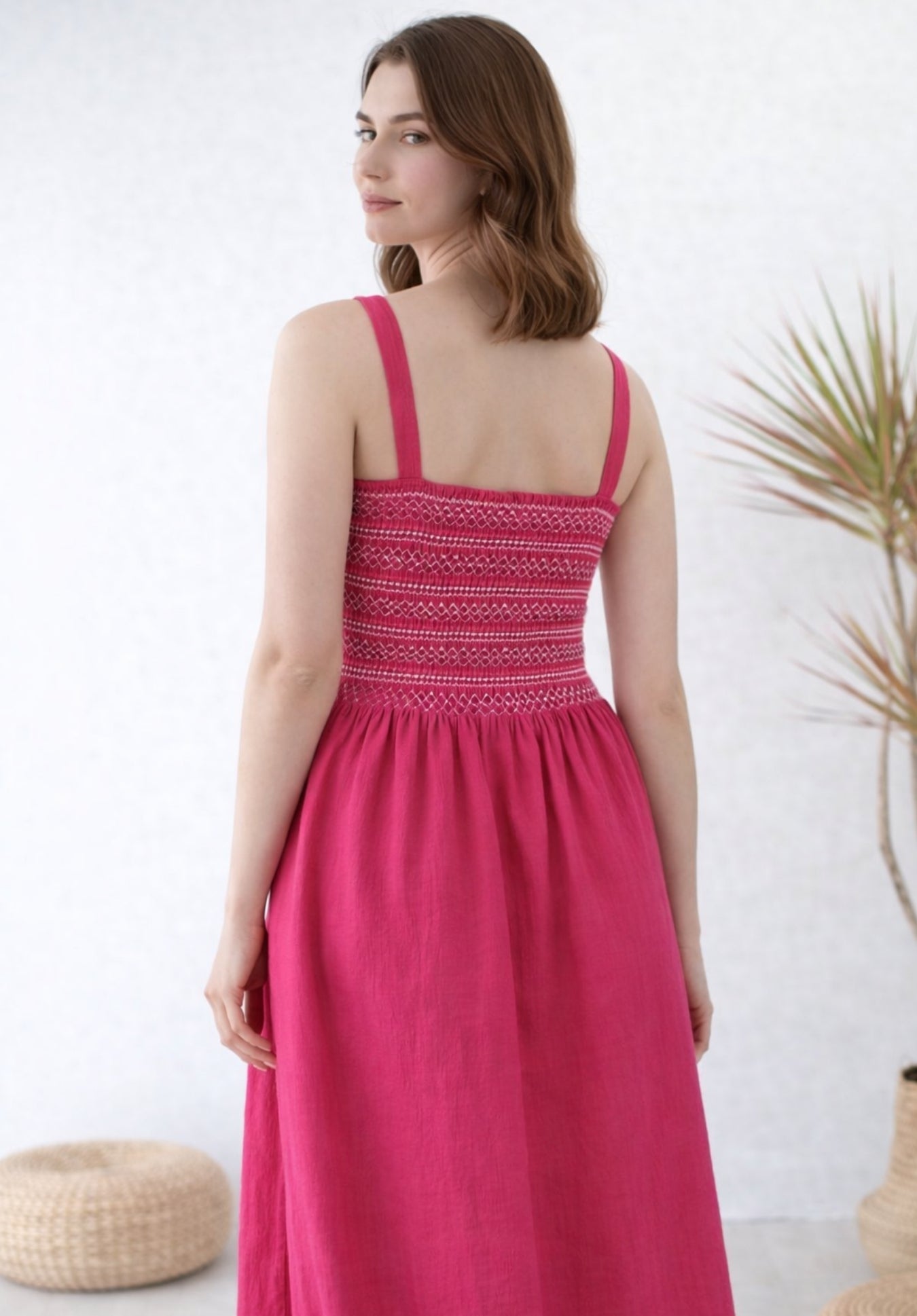 Pink pleated cotton dress back view
