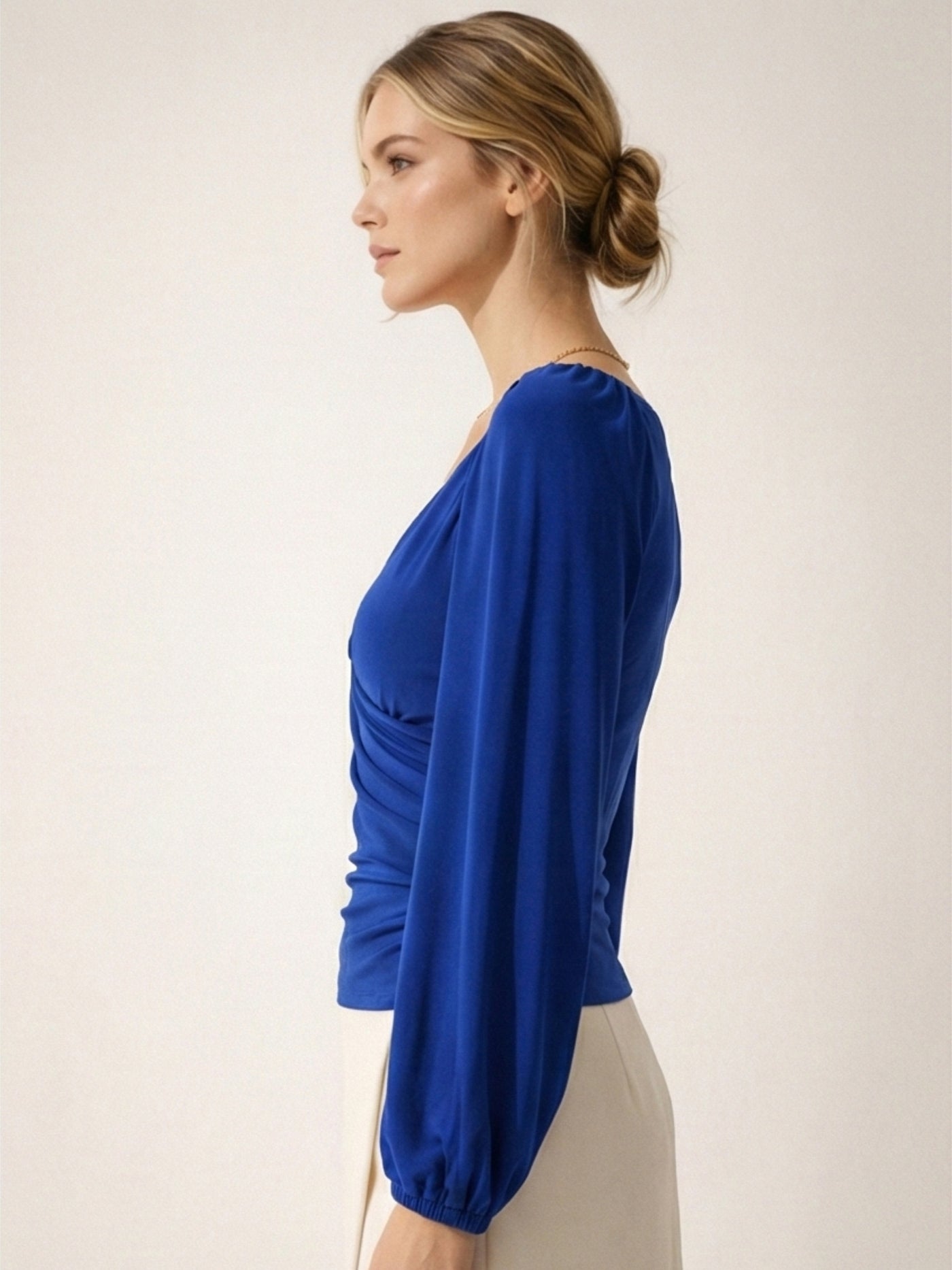 Back view of royal blue wrap top