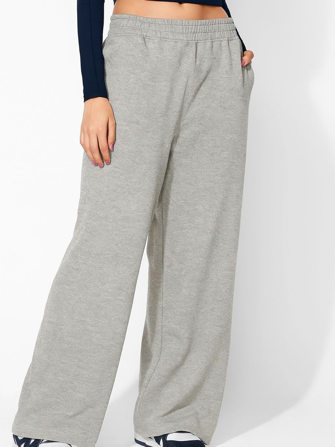Back view of grey track pants