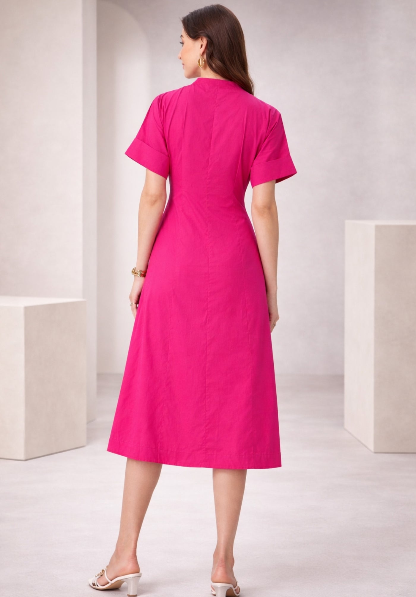 Back view of pink A-line midi dress in pure cotton