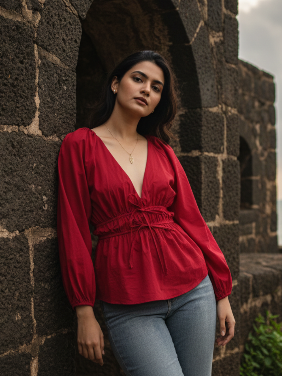 Front view of pink poplin cotton V-neck top with long sleeves