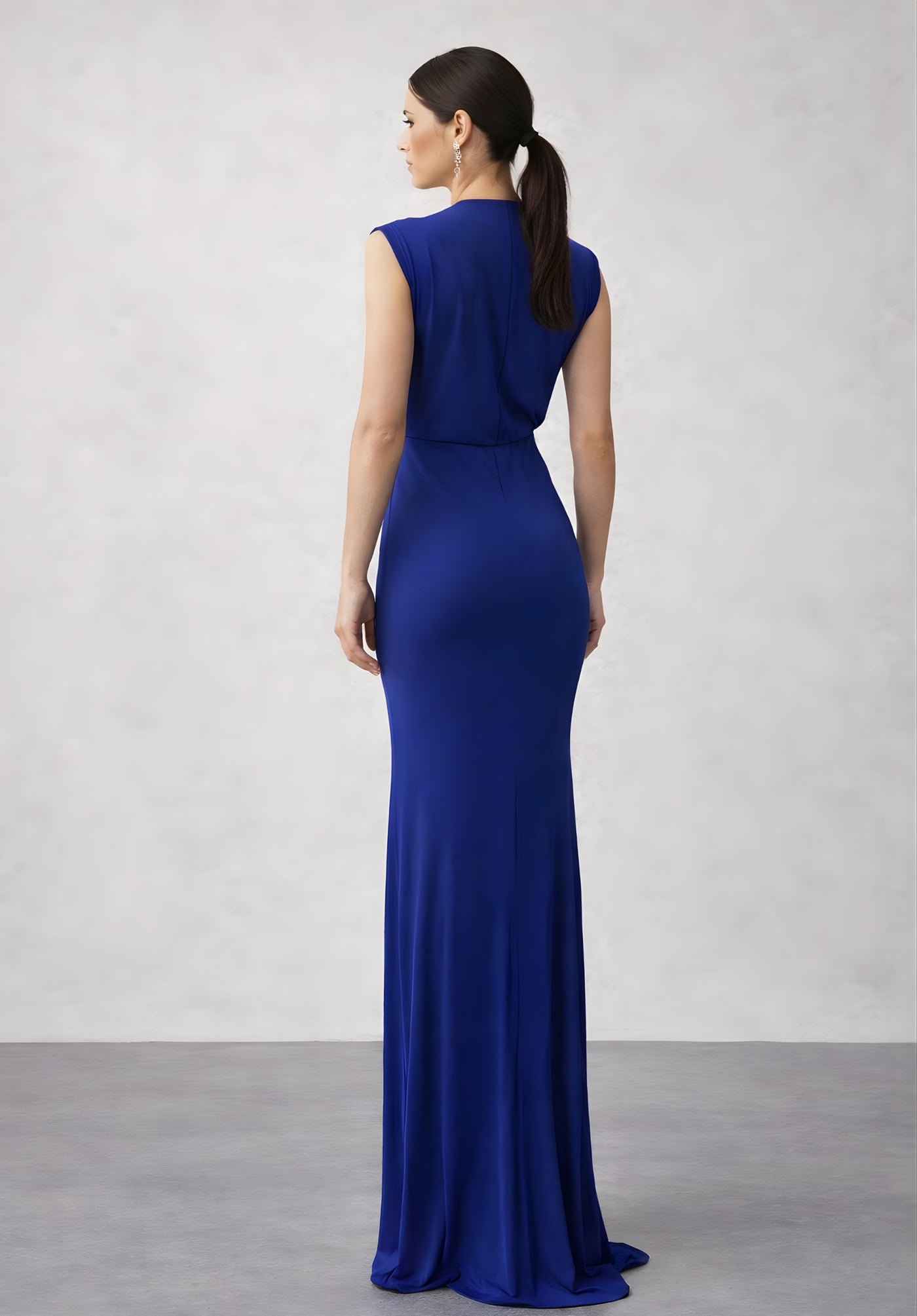 Full-length view of royal blue bodycon dress on model