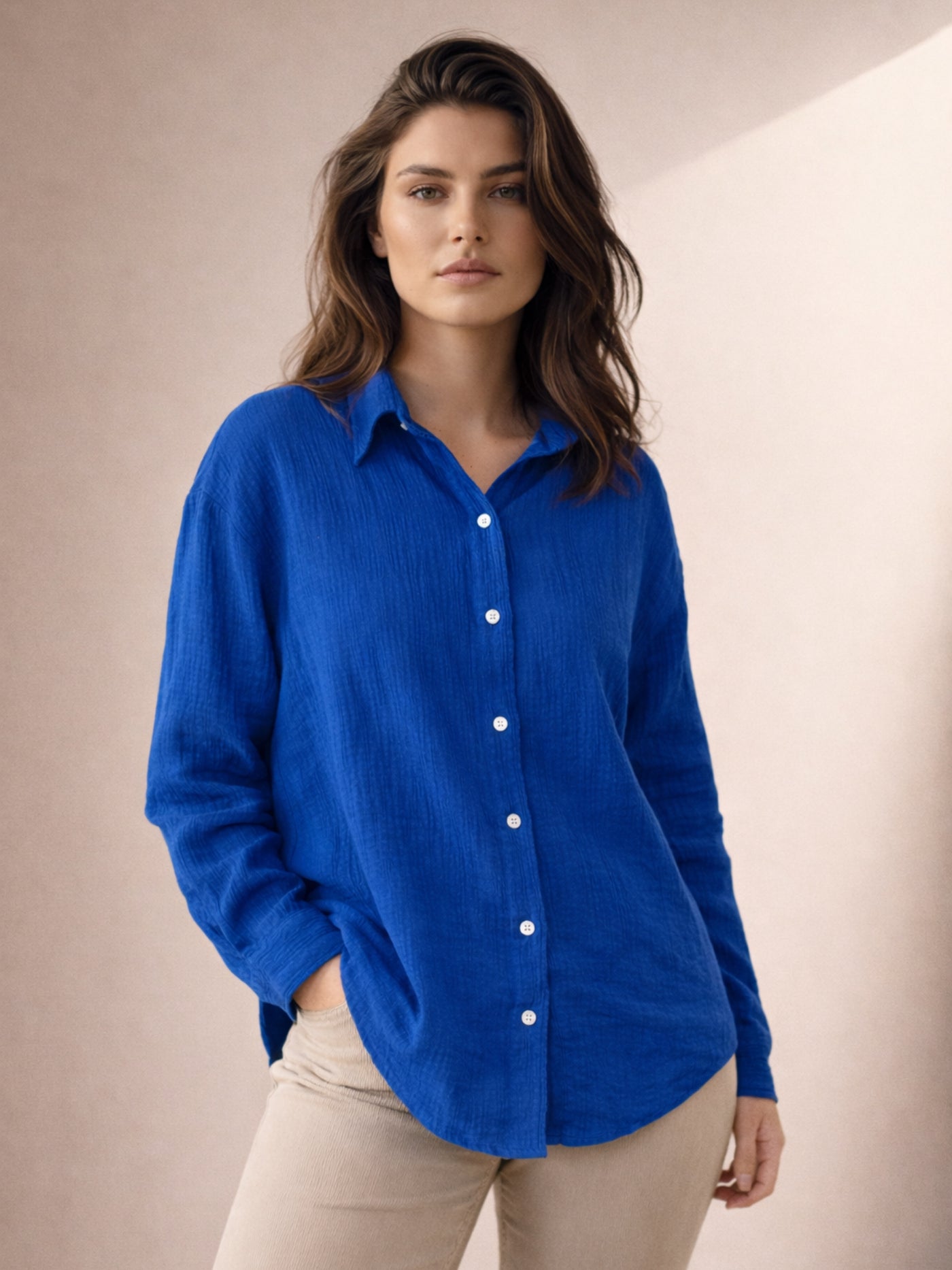 Back view of oversized blue cotton shirt